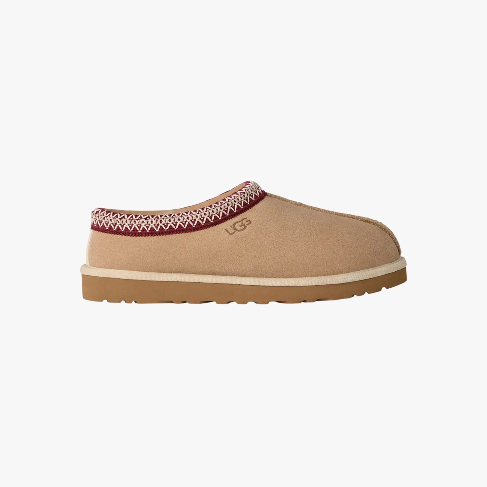 Tan suede UGG slip-on shoe with maroon and white stitched trim and brown rubber sole.