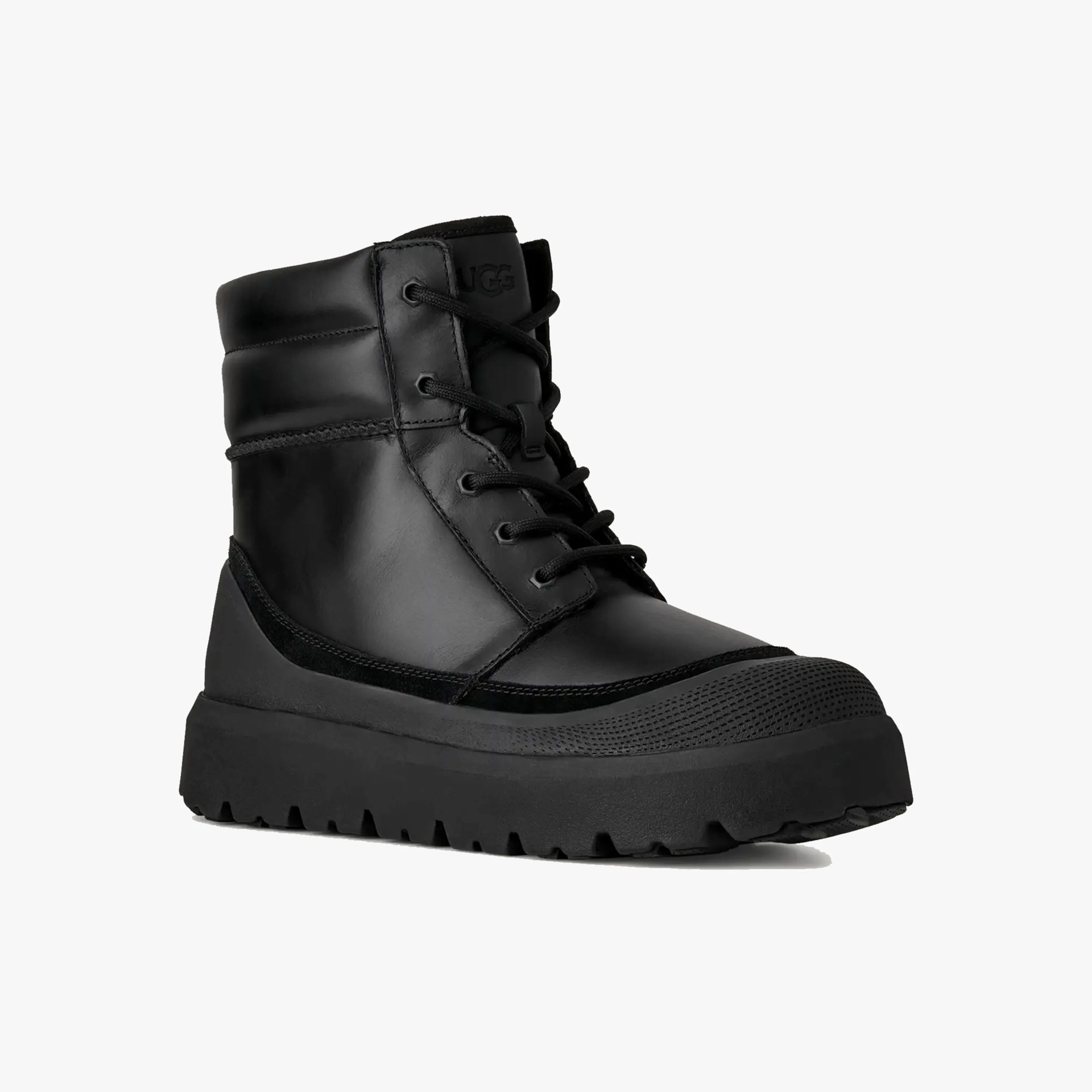 Black leather lace-up ankle boot with padded collar and thick rubber sole.