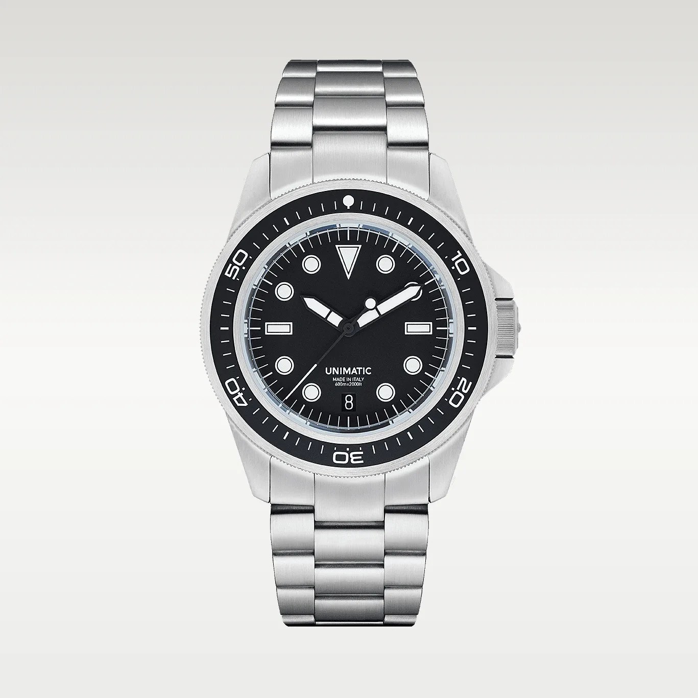 Stainless steel dive watch with black dial, white markers, and rotating bezel on metal bracelet.