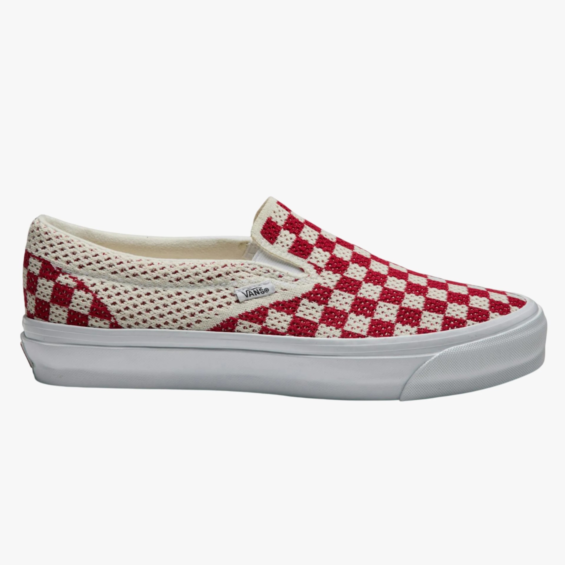 Red and white checkered knit Vans slip-on sneaker with white rubber sole.