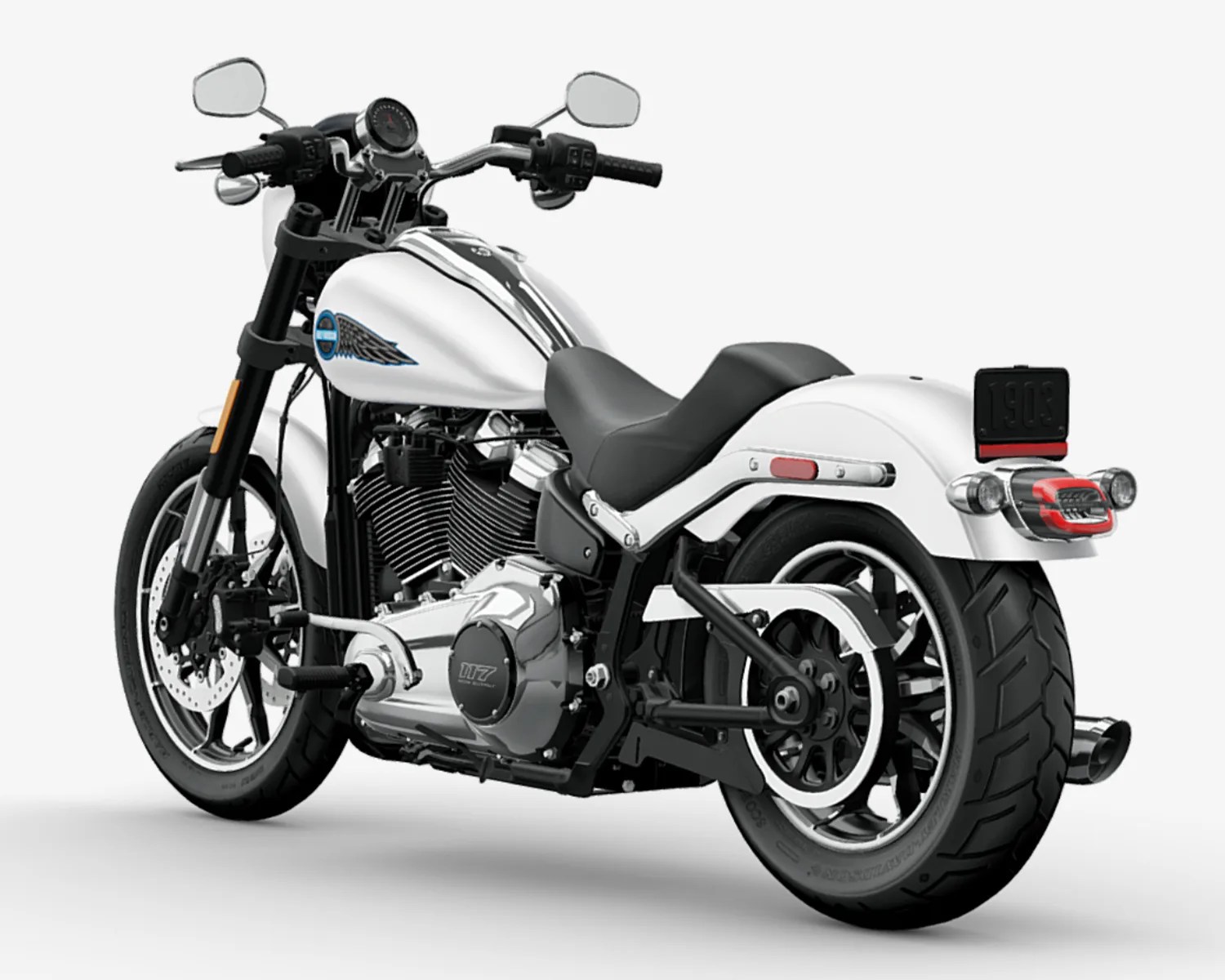 White cruiser motorcycle with black seat, chrome engine, and black wheels on a white background.