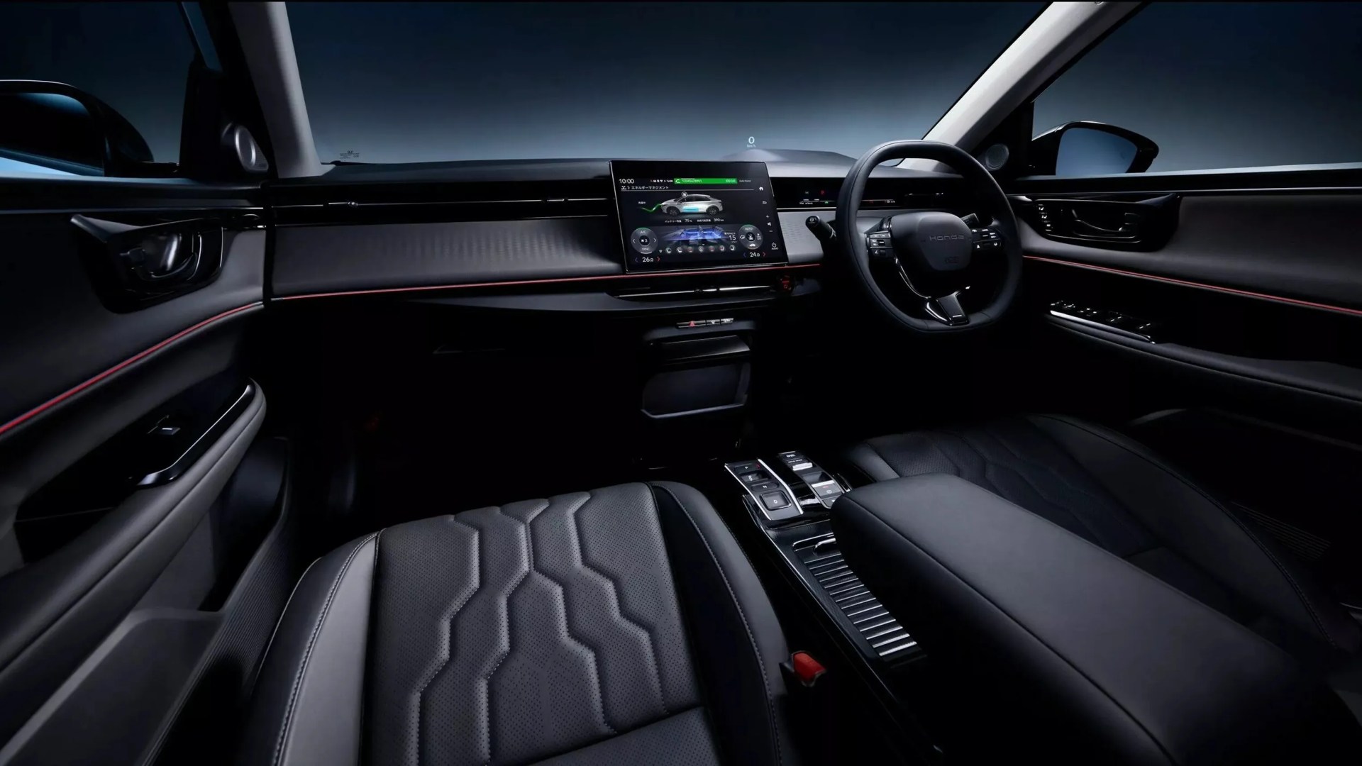 Black car interior with hexagonal-patterned leather seats, digital touchscreen dashboard, and red accent trim.