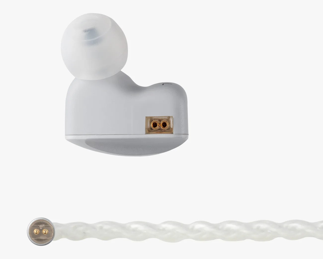White in-ear earphone with translucent silicone tip and detachable twisted white cable with gold connectors.