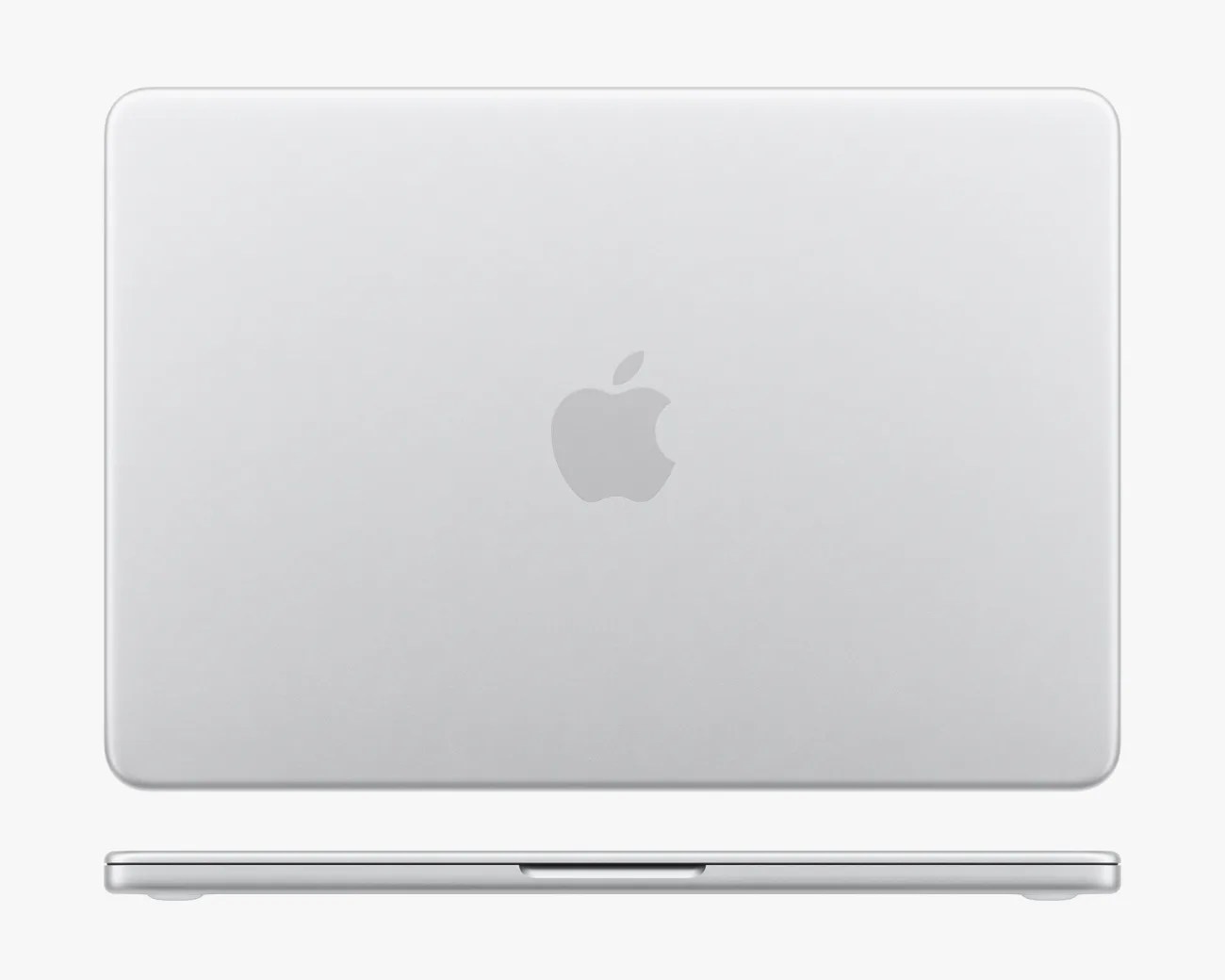 Silver Apple MacBook laptop closed, shown from top and side views.