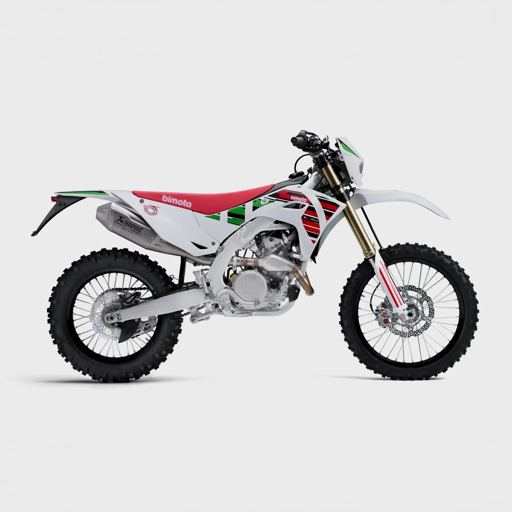 White and red Bimota off-road motorcycle with knobby tires and green and black graphics on a white background.