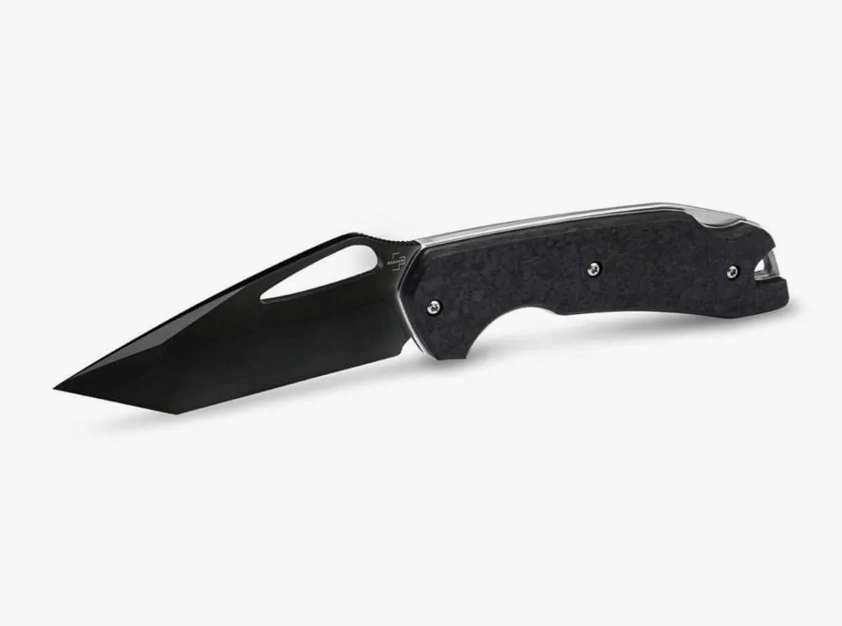 Black folding knife with a tanto-style blade and textured dark handle on a white background.