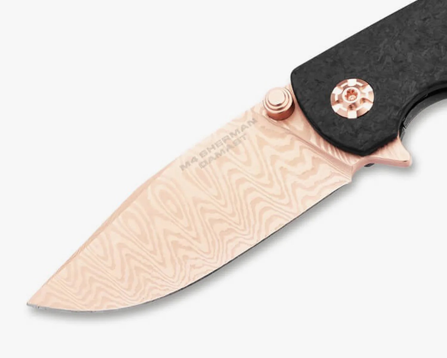 Close-up of a rose gold Damascus patterned knife blade with black handle and rose gold screws.