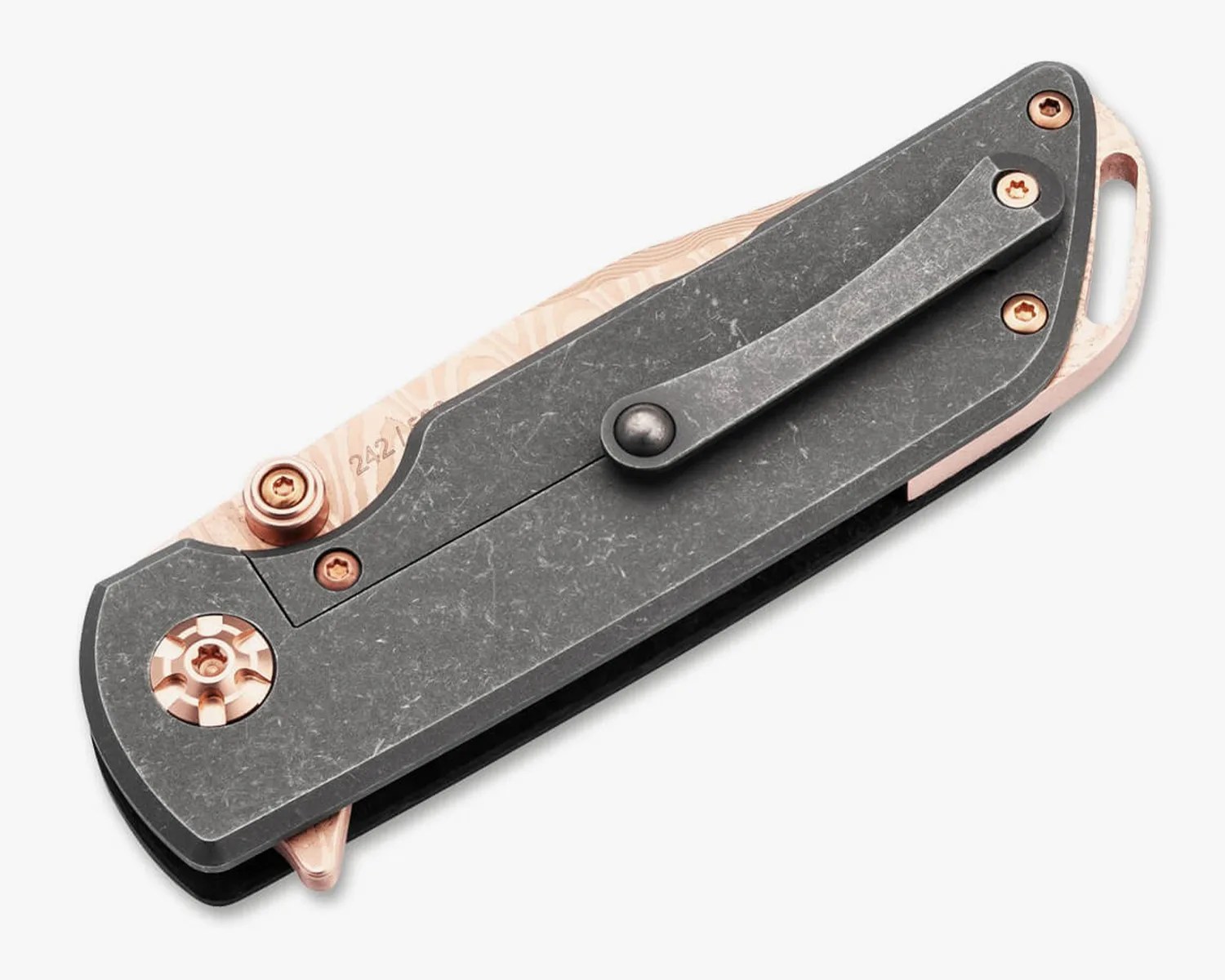 Folded pocket knife with a black stonewashed handle and copper accents, including screws and a clip.