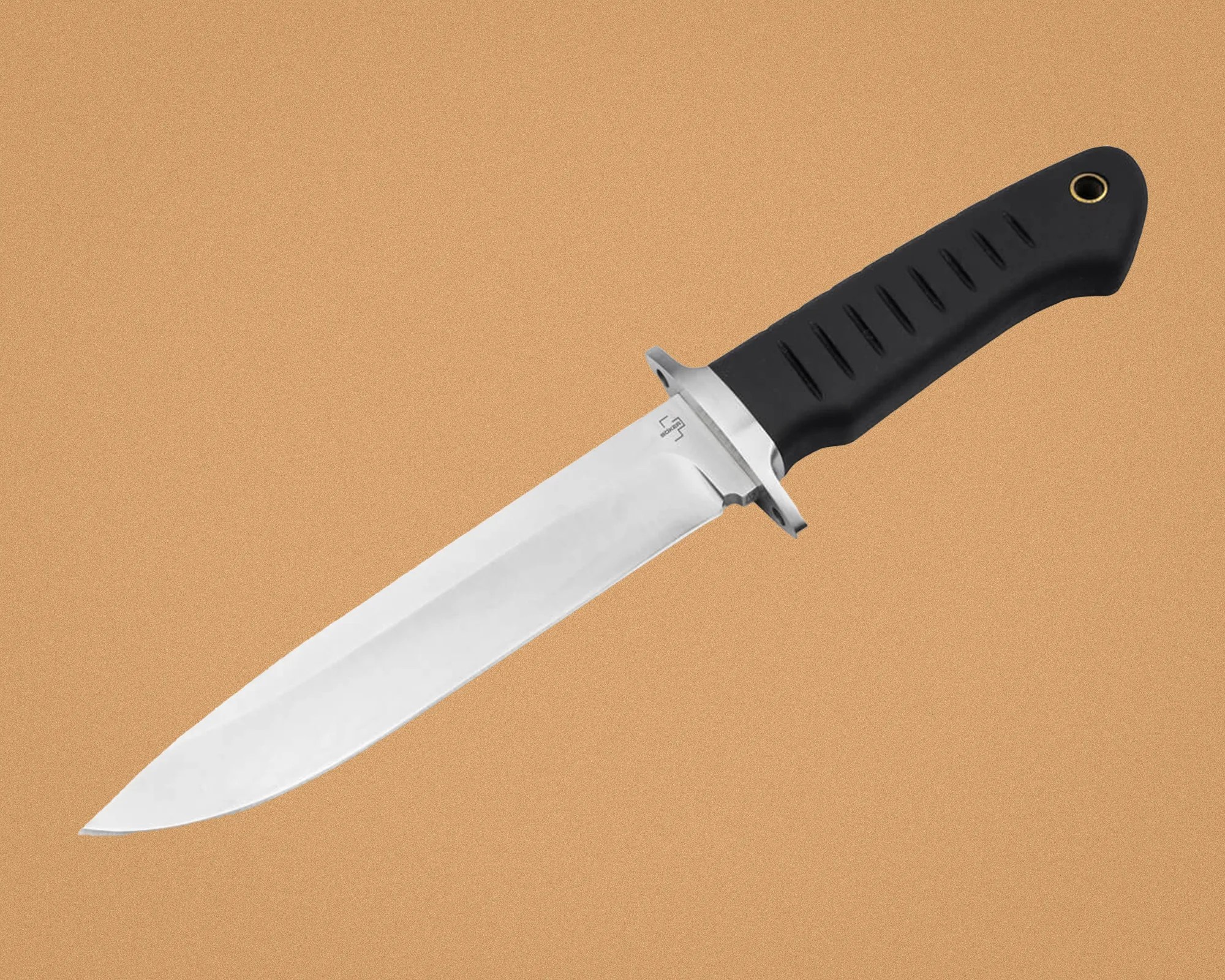 Fixed-blade knife with a stainless steel blade and black textured handle on a tan background.