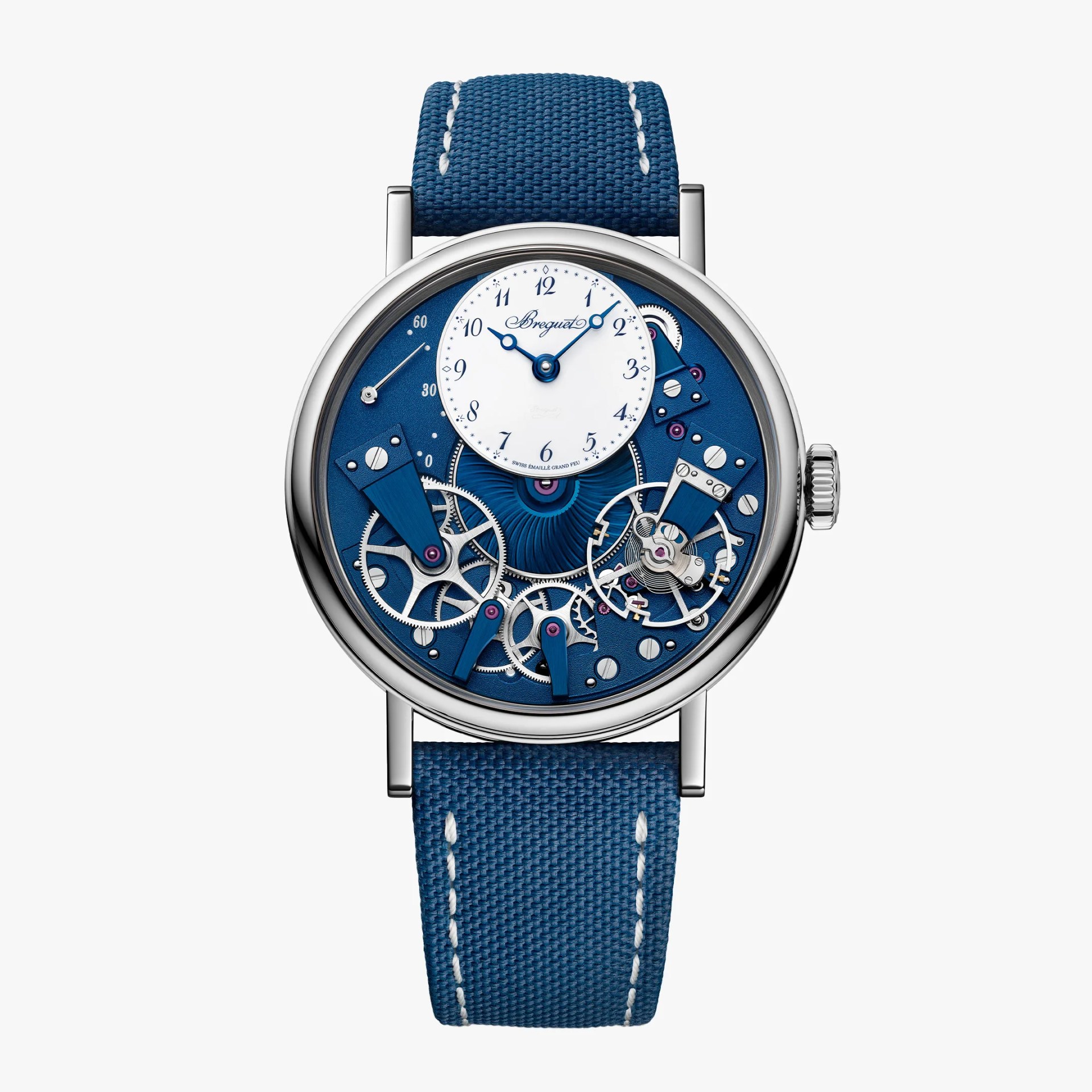 Silver wristwatch with blue mechanical dial, white subdial with Arabic numerals, and blue fabric strap with white stitching.