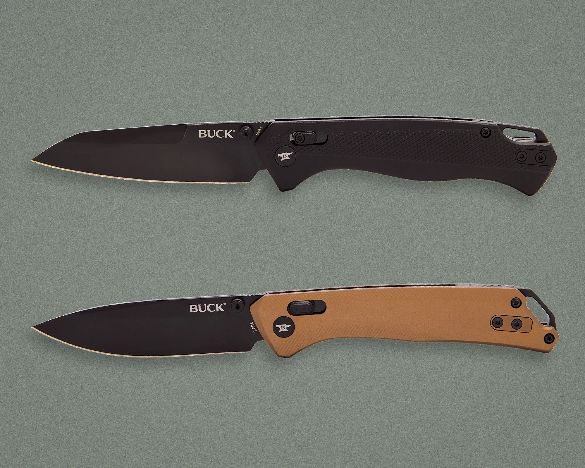Two Buck folding knives with black blades, one with a black textured handle and the other with a tan smooth handle, on a gray surface.