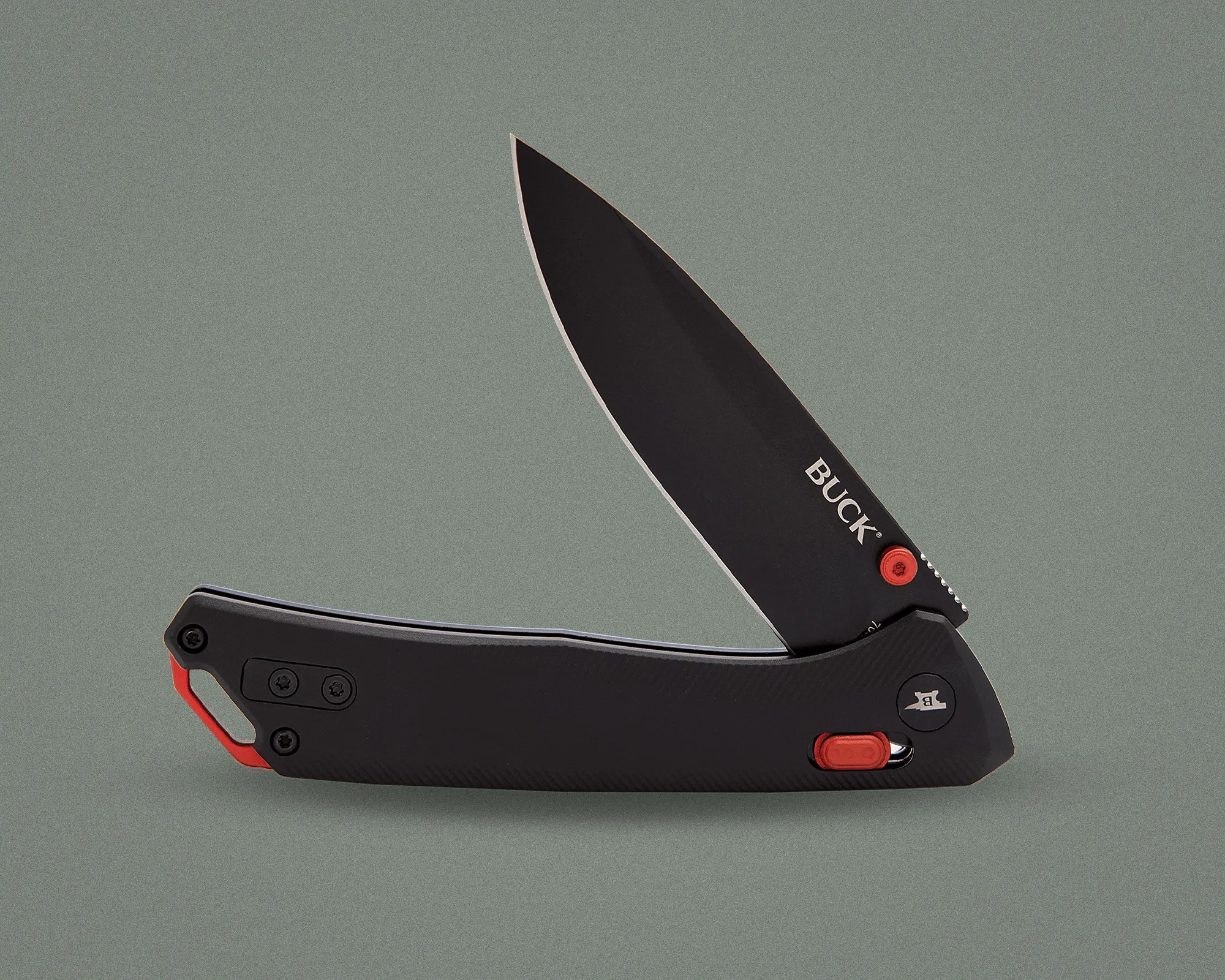 Black folding knife with partially open blade and red accents on a gray background.