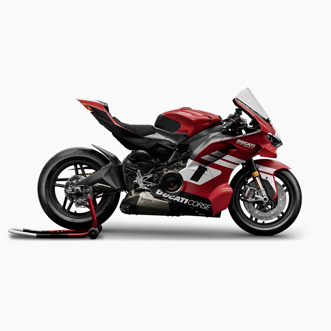 Red and white Ducati Corse sport motorcycle on a rear wheel stand against a white background.