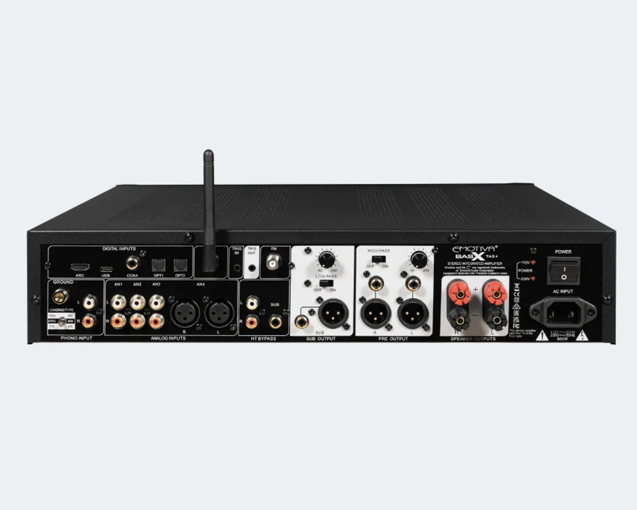 Rear view of a black Emotiva BasX TA2 stereo integrated amplifier showing multiple digital, analog, sub, pre, and speaker output ports with a power switch and antenna.