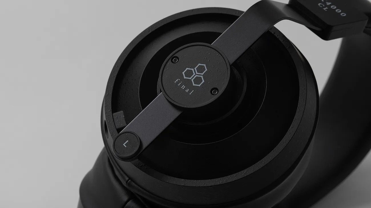 Close-up of black Final brand headphone ear cup with visible logo and left side indicator.