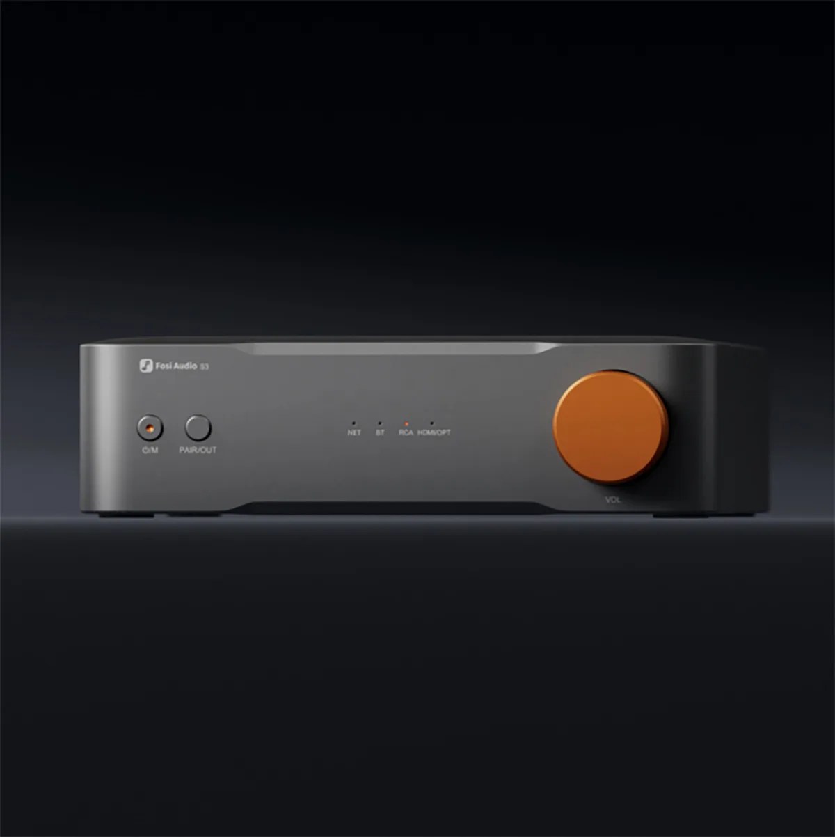 Black Fosi Audio S3 amplifier with orange volume knob and two small buttons on the front panel.