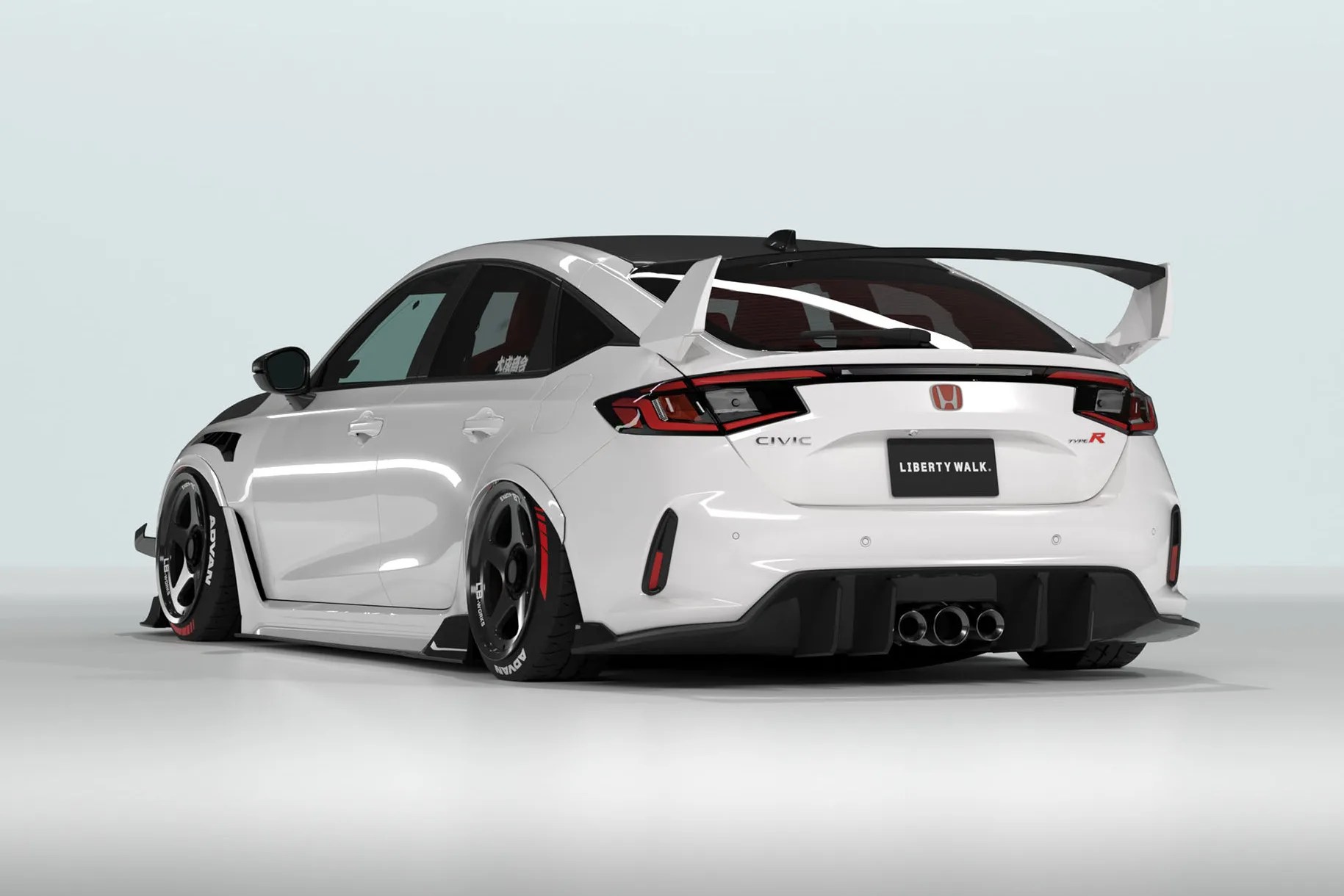 White Honda Civic Type R with widebody kit, large rear wing, black wheels, and lowered stance in a studio setting.