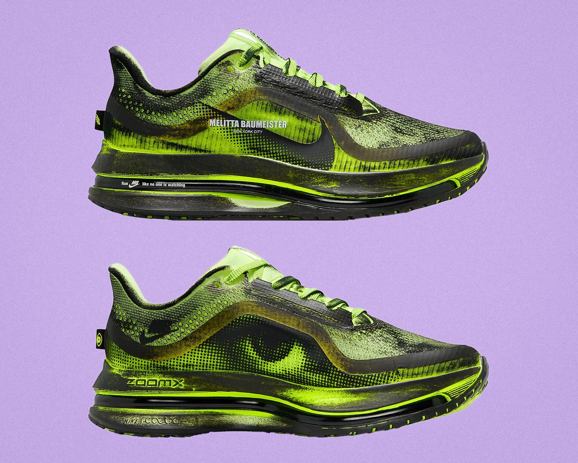 Pair of neon green and black Nike ZoomX running shoes with "Melitta Baumeister New York City" text on the side, shown from both lateral and medial views on a purple background.