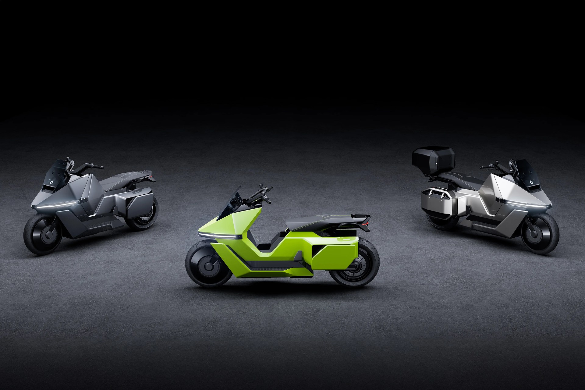 Three futuristic motorcycles in a row on a dark floor, with two silver models on the sides and a lime green model in the center.