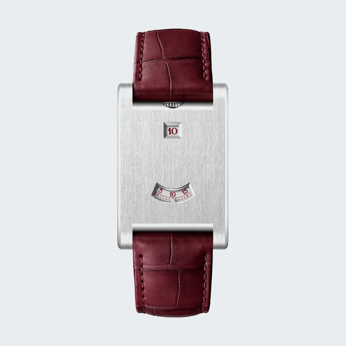 Rectangular silver brushed metal watch with burgundy leather strap and digital time display windows.