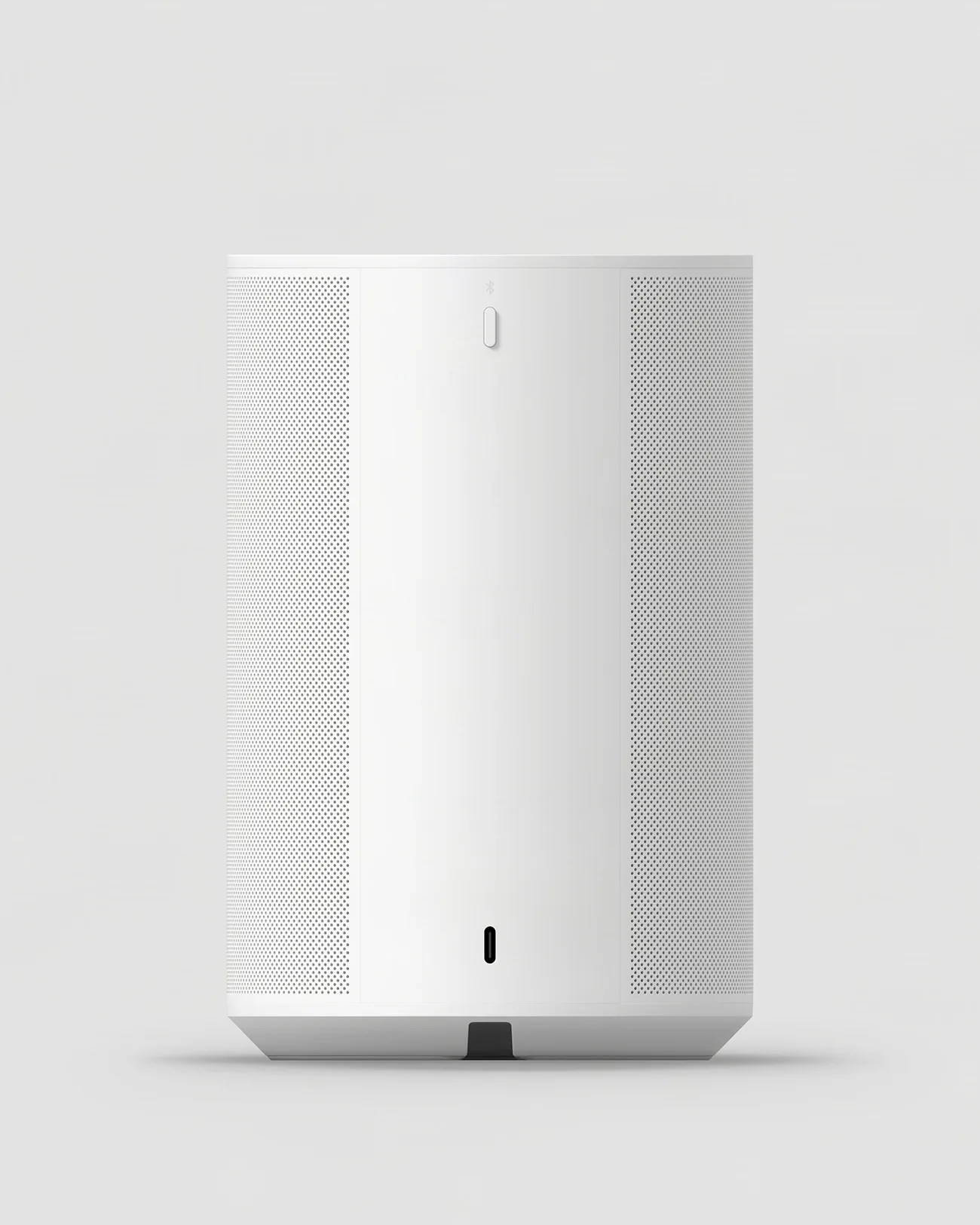 White cylindrical smart speaker with perforated sides and a Bluetooth button on the front.