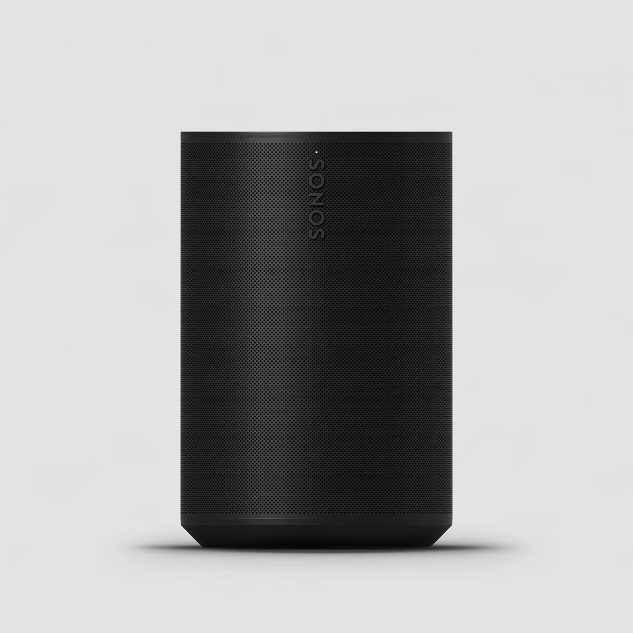 Black Sonos wireless speaker with perforated grille and vertical logo on a light gray background.