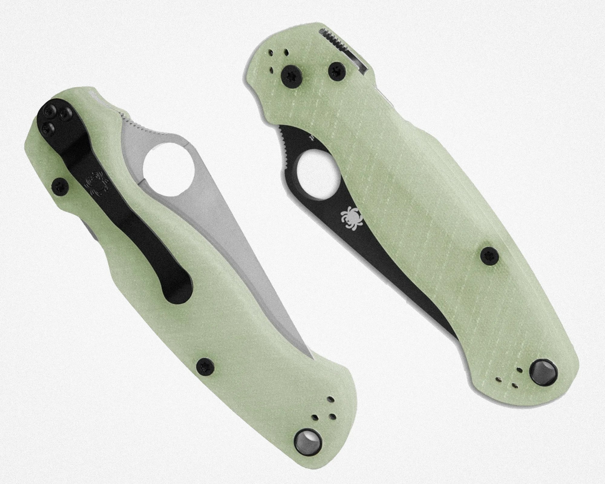 Two folding knives with light green textured handles and black clips, one showing the blade partially open and the other closed.
