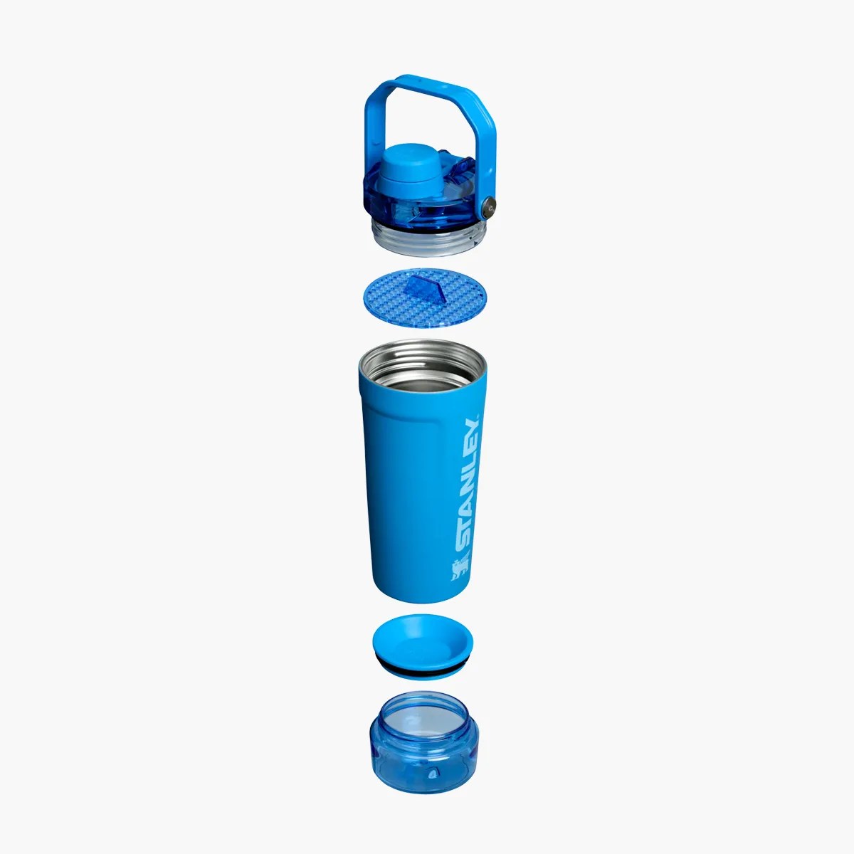 Blue Stanley insulated bottle with its lid, filter, and base cap separated and aligned vertically.
