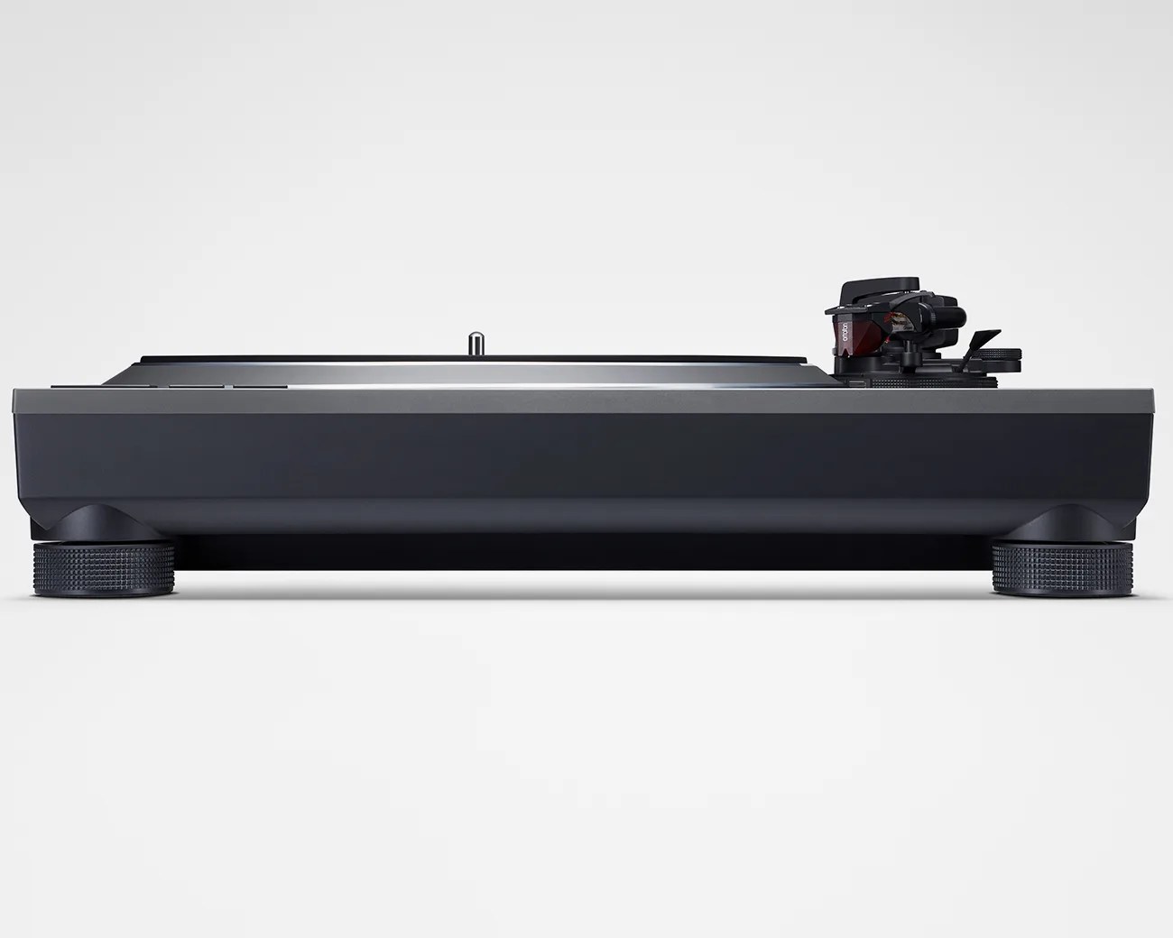 Black and gray modern turntable with textured circular feet on a white background.