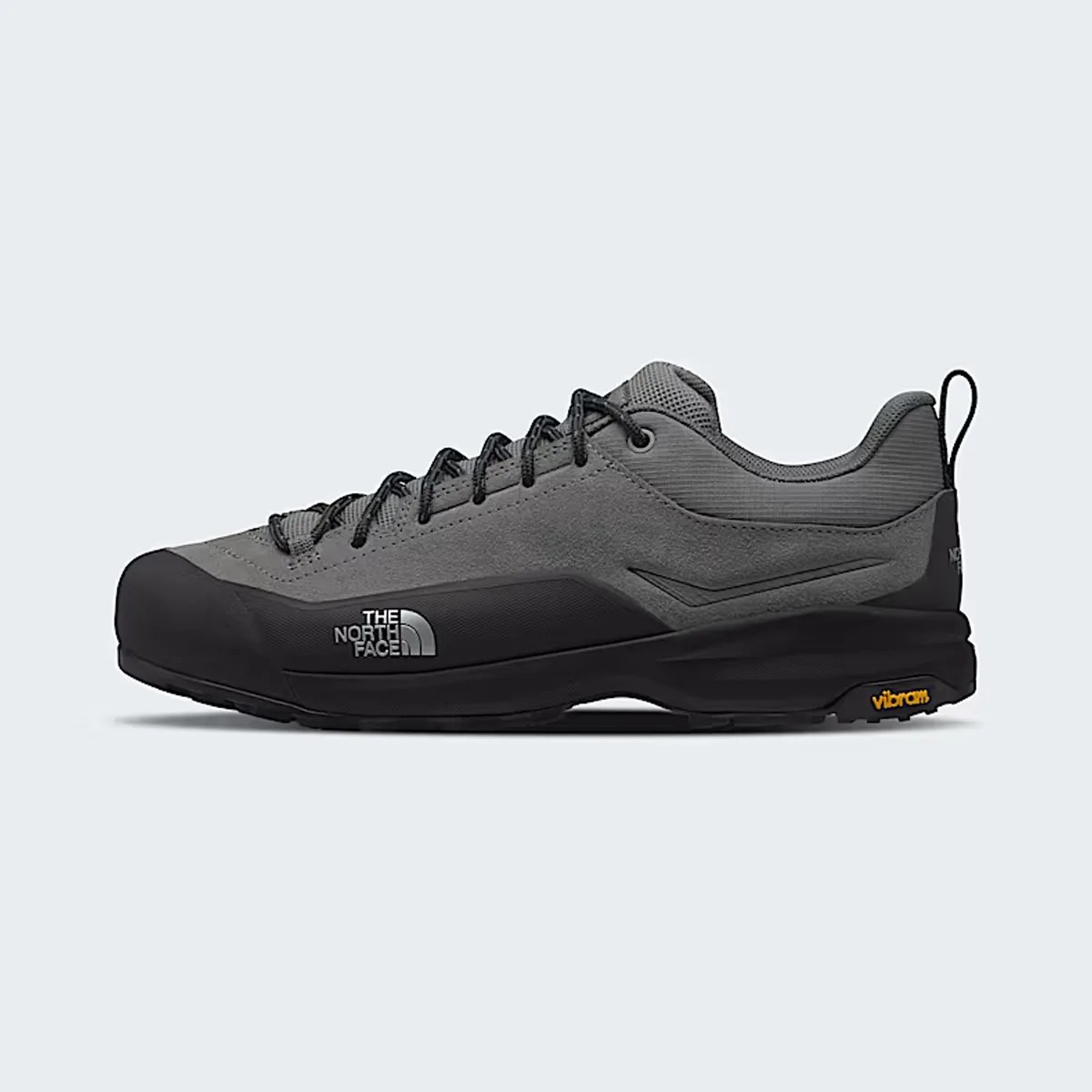 Gray and black low-top hiking shoe with black laces and The North Face logo on the side.