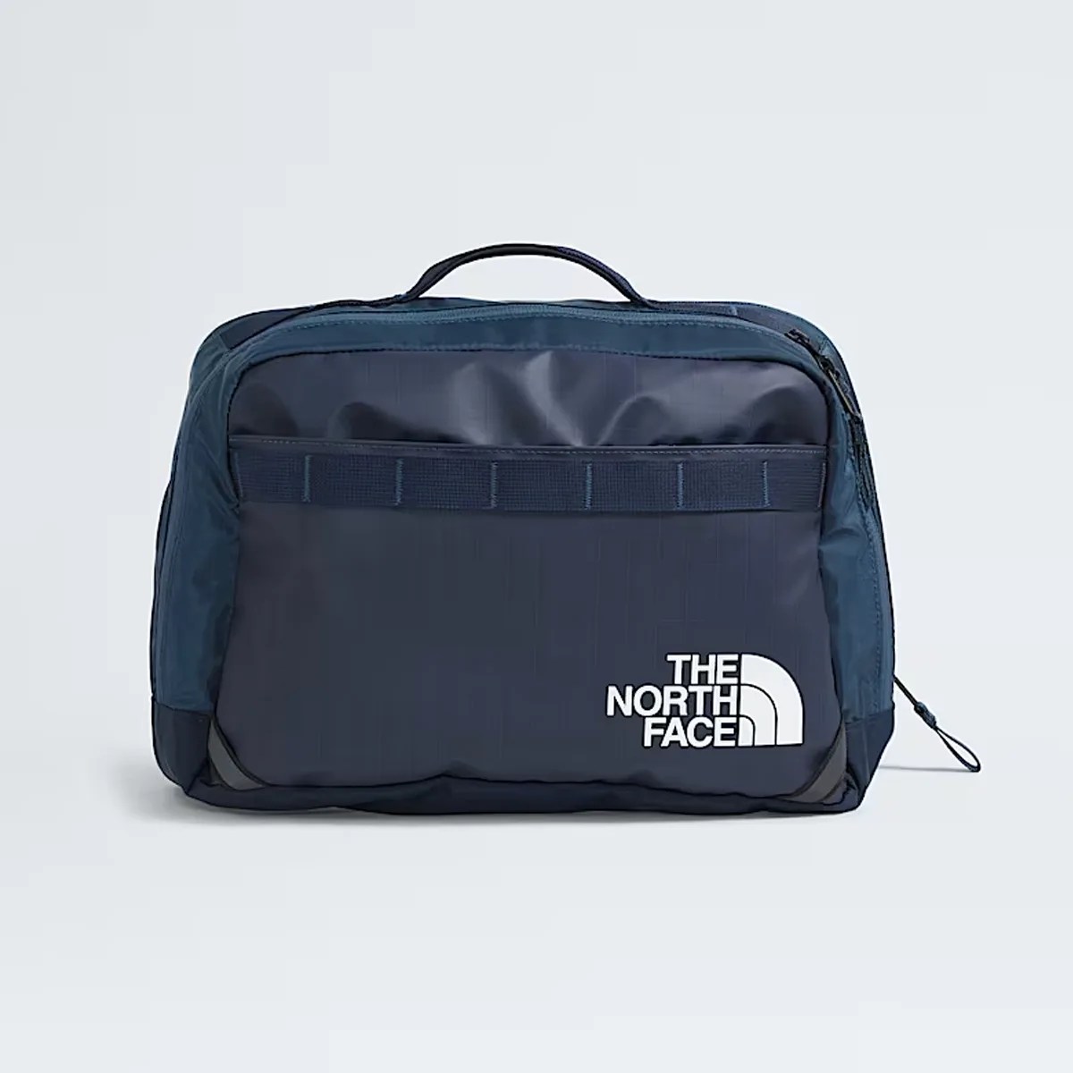 Navy blue rectangular The North Face bag with a top handle and front logo.