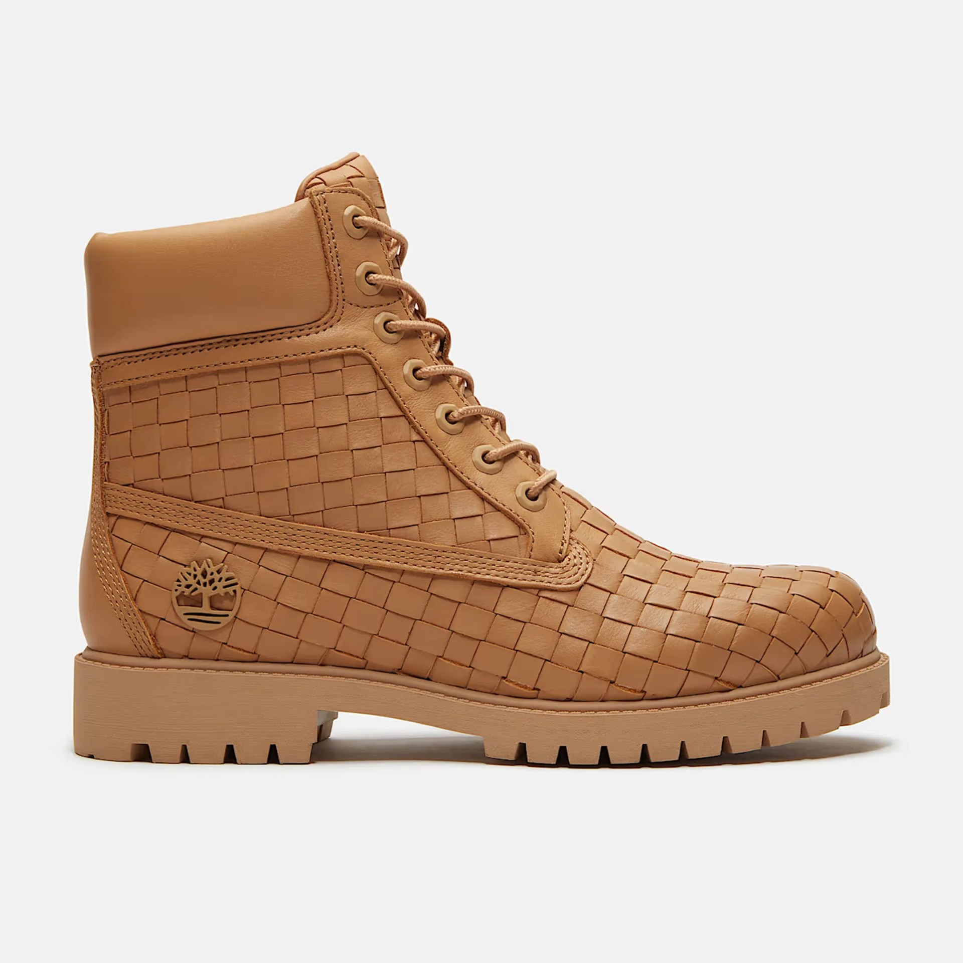 Tan woven leather lace-up boot with padded collar and rugged sole.