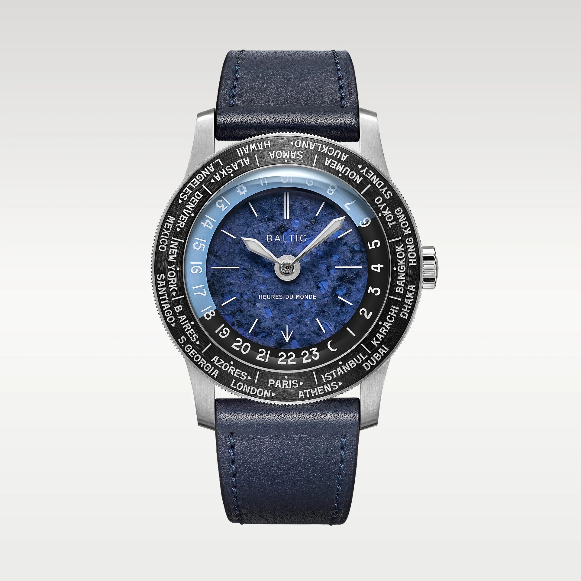 Silver Baltic wristwatch with blue textured dial, black world time bezel, and navy leather strap.