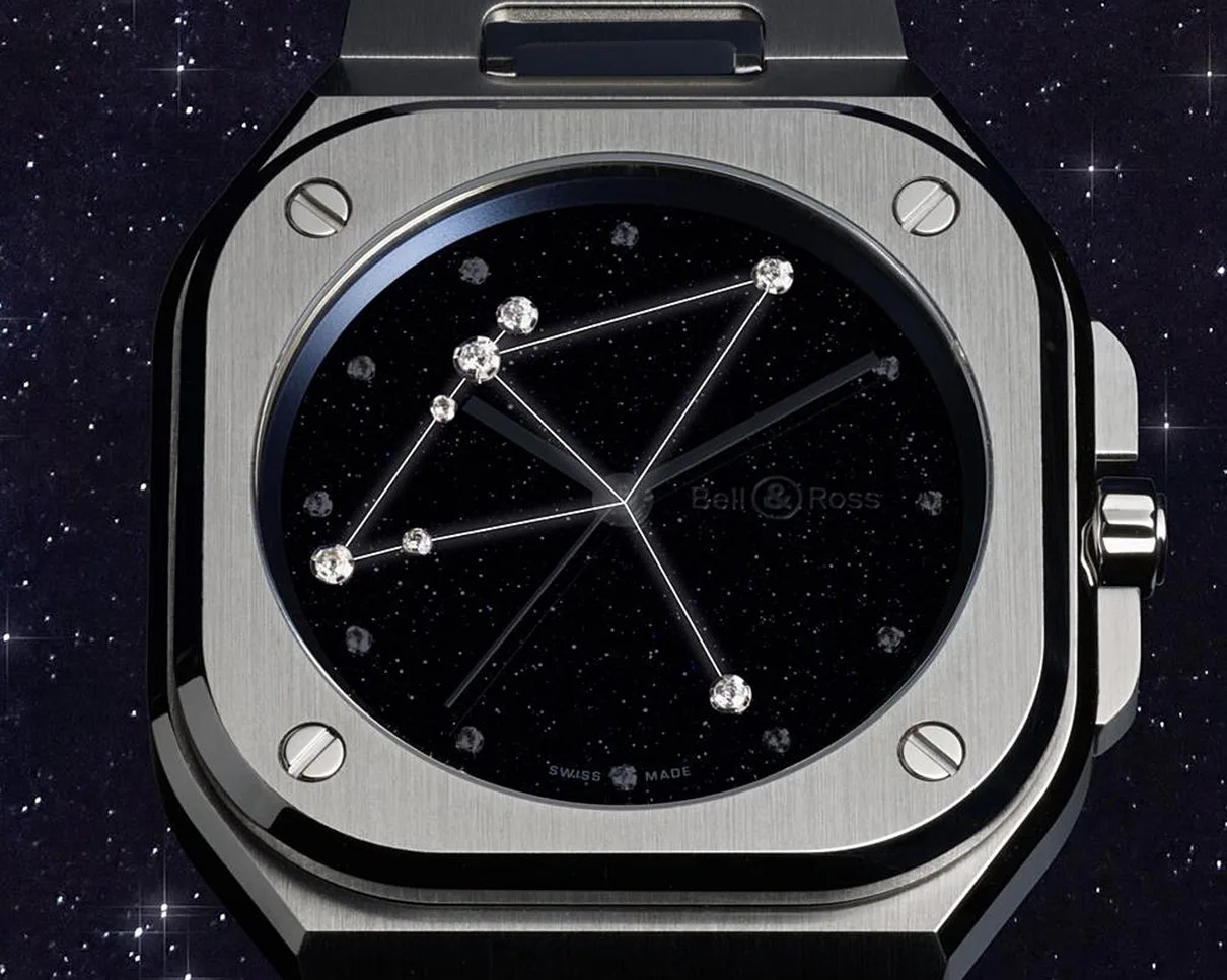 Square silver metal watch with black starry dial featuring a constellation design with diamond markers.