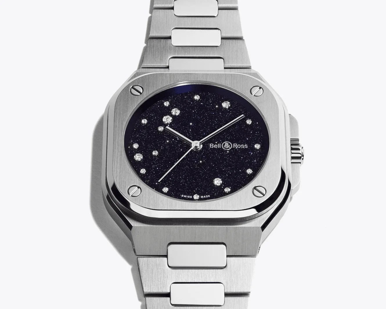Silver Bell & Ross wristwatch with a square case and a dark starry dial featuring diamond hour markers.