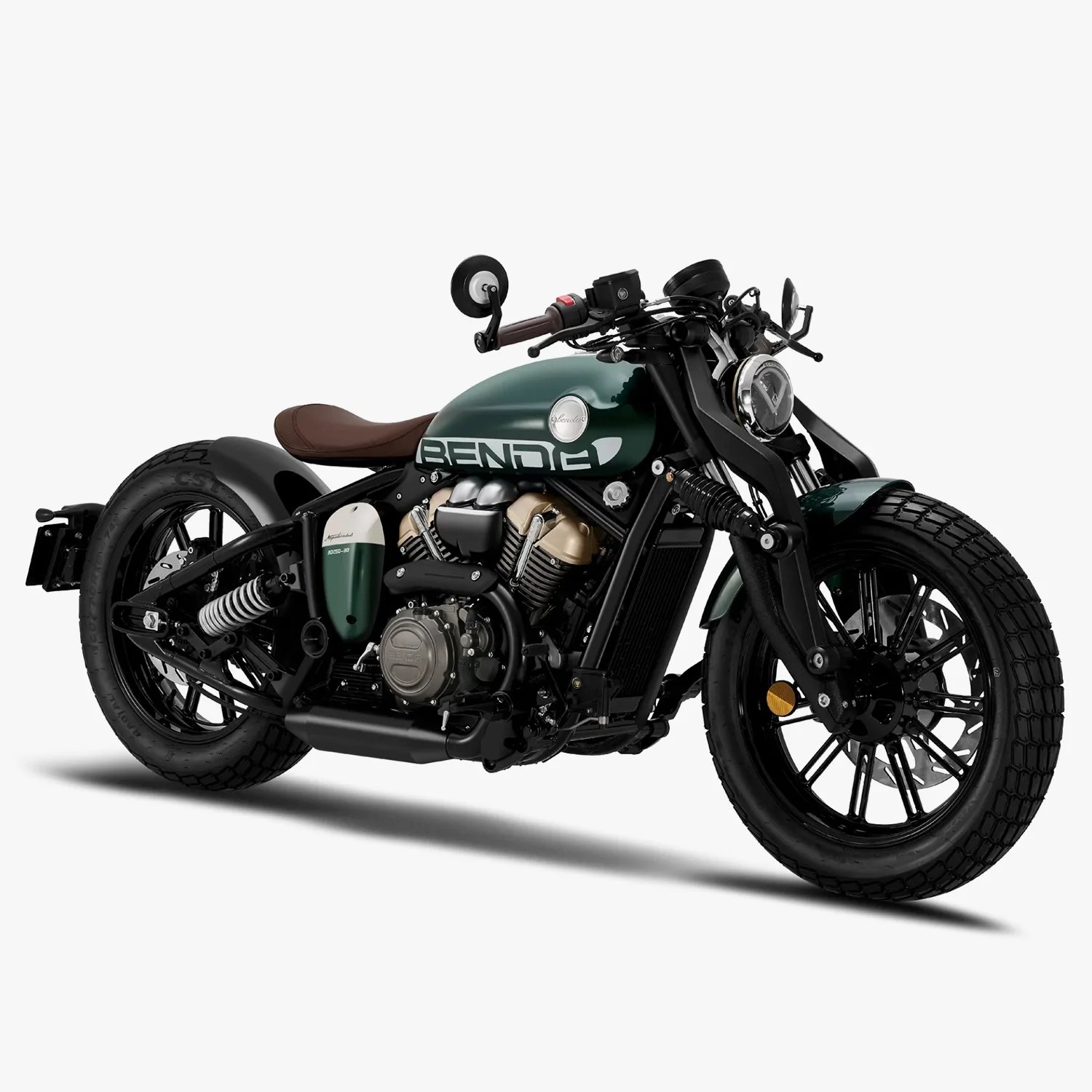 Dark green and black cruiser motorcycle with brown leather seat and round headlight.