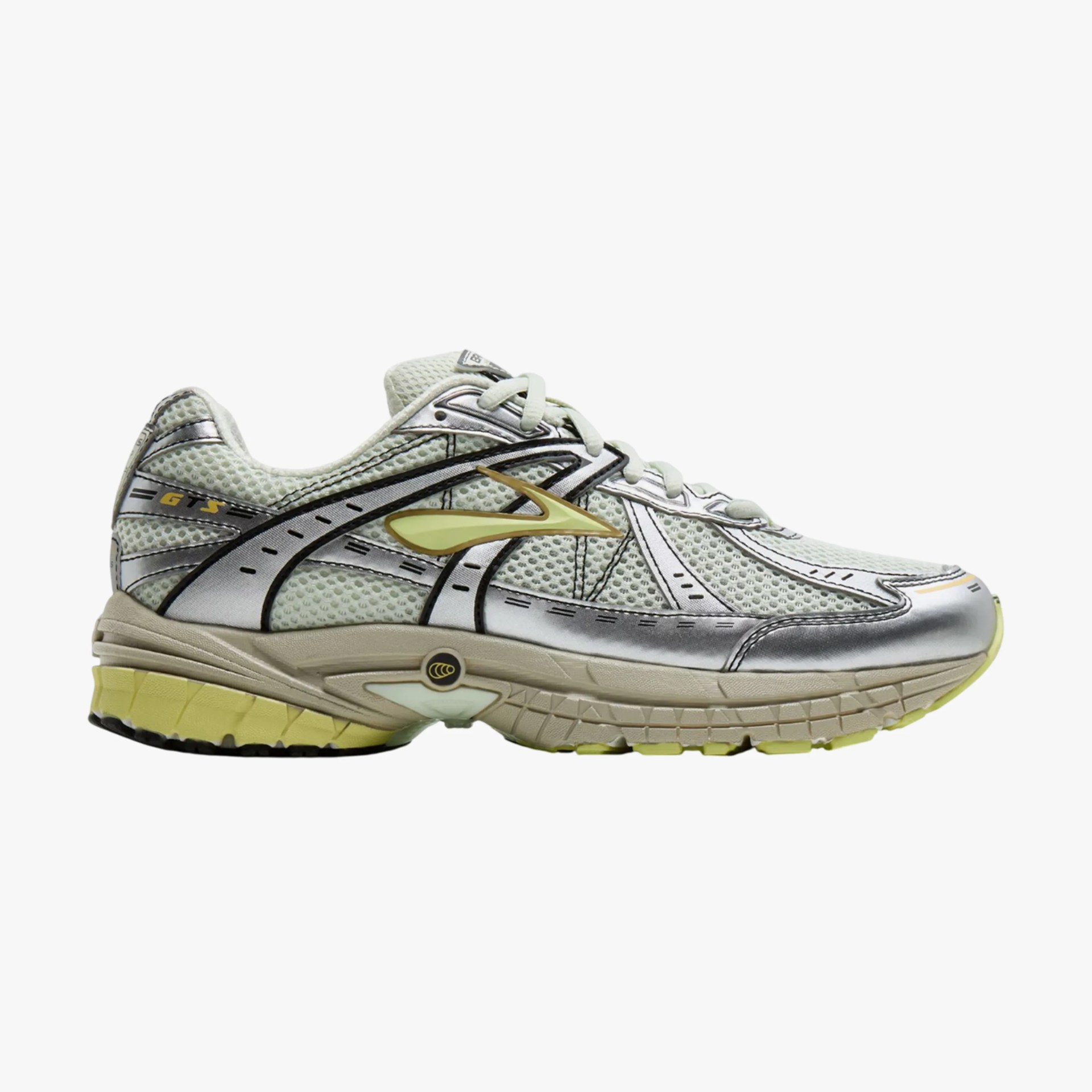 Light green and silver mesh running shoe with yellow accents and beige sole, side view.
