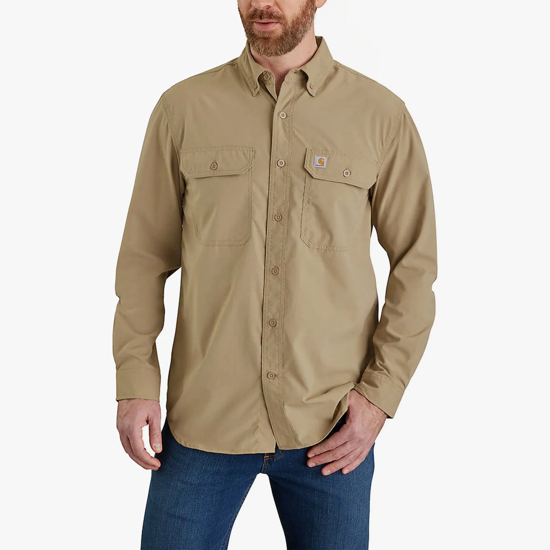 Light brown long-sleeve button-up shirt with two chest pockets worn by a person.