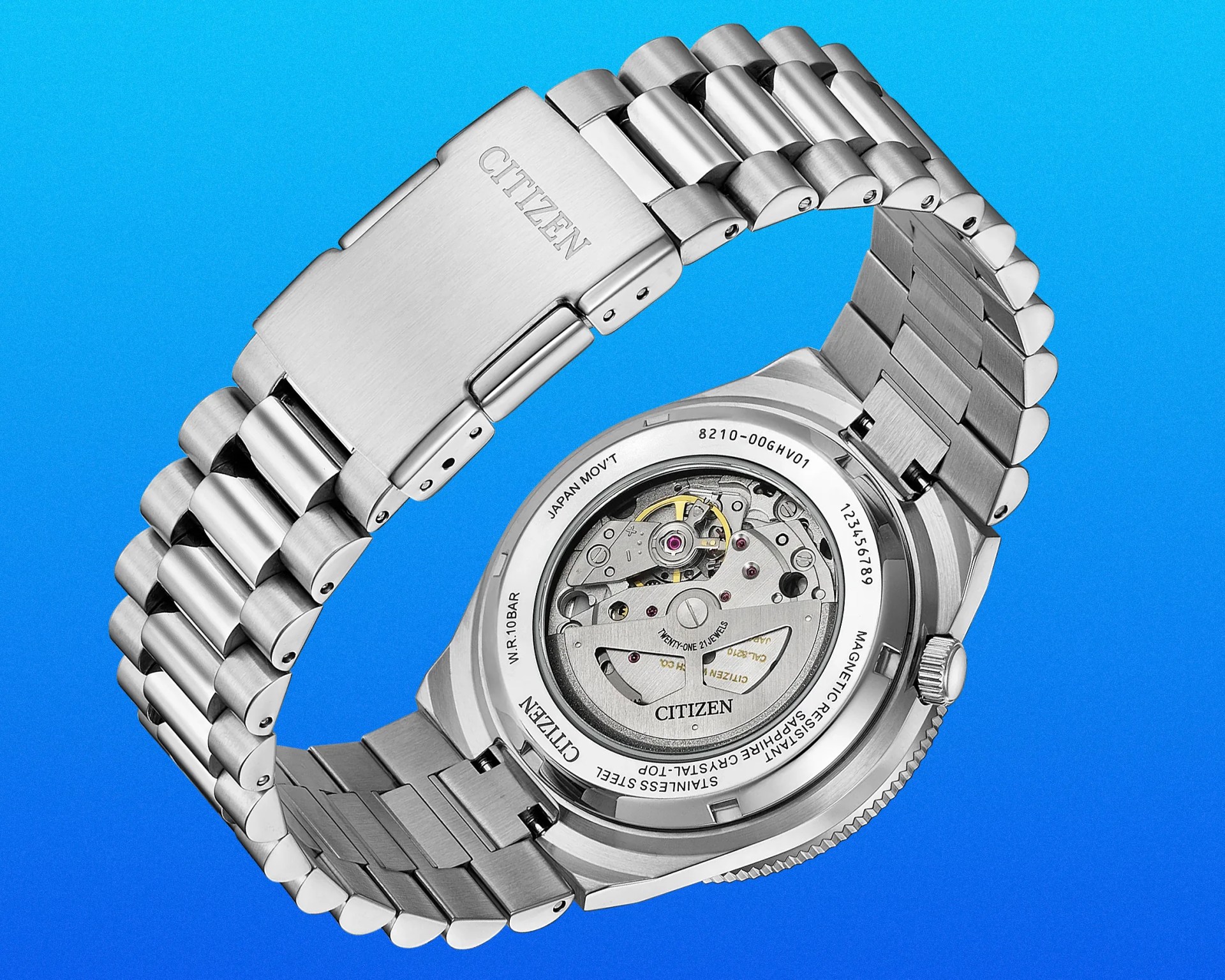 Stainless steel Citizen wristwatch showing transparent case back with visible automatic movement and metal bracelet.