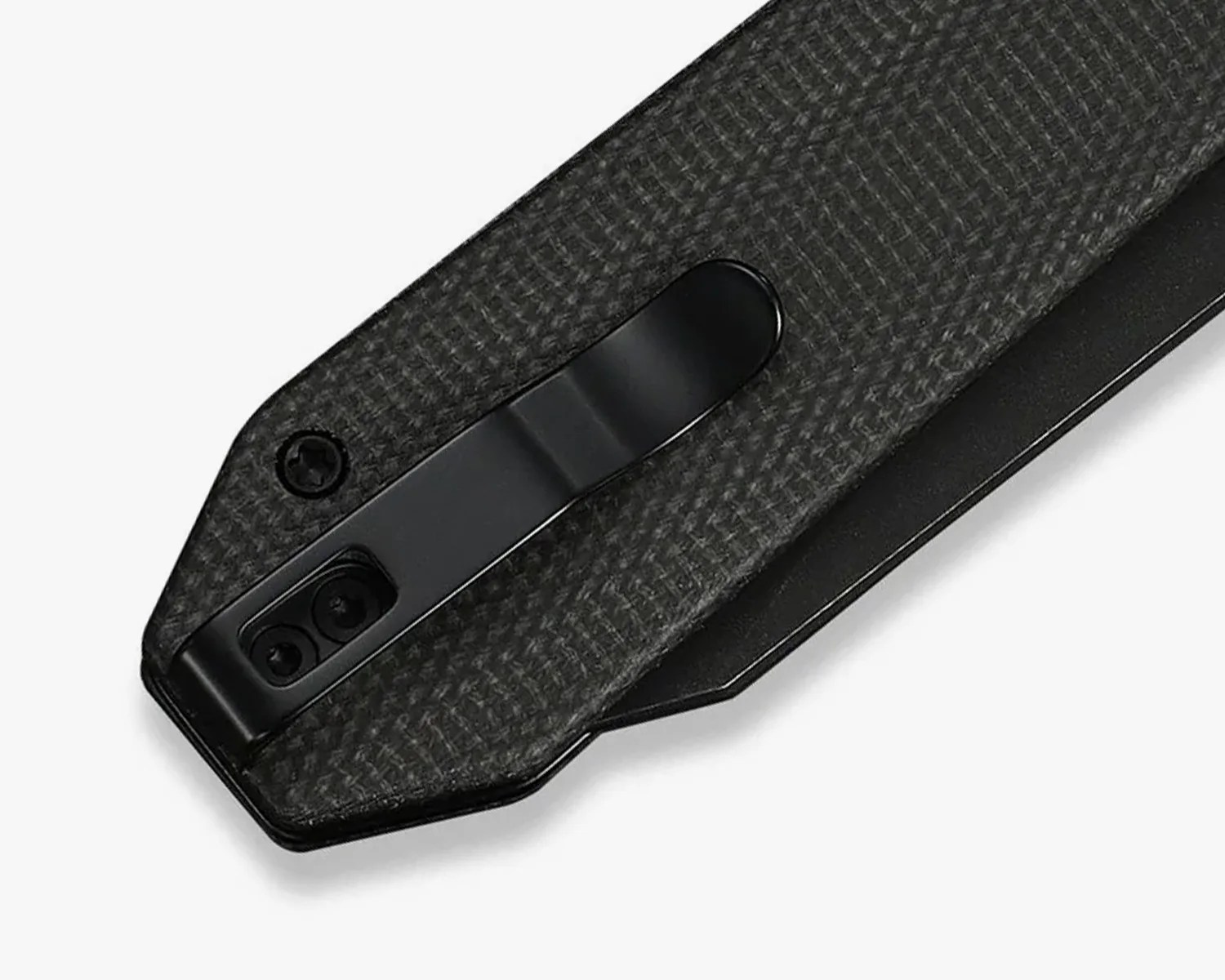 Close-up of a black textured knife handle with a black metal pocket clip attached by screws.