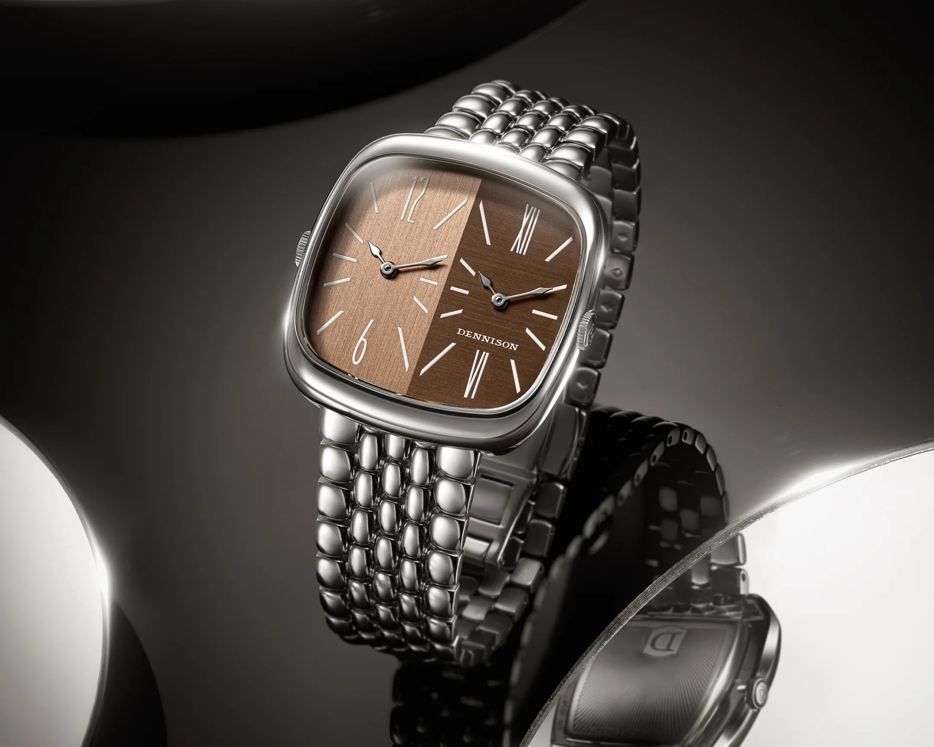 Silver metal wristwatch with a dual-tone brown rectangular dial and a linked bracelet band.