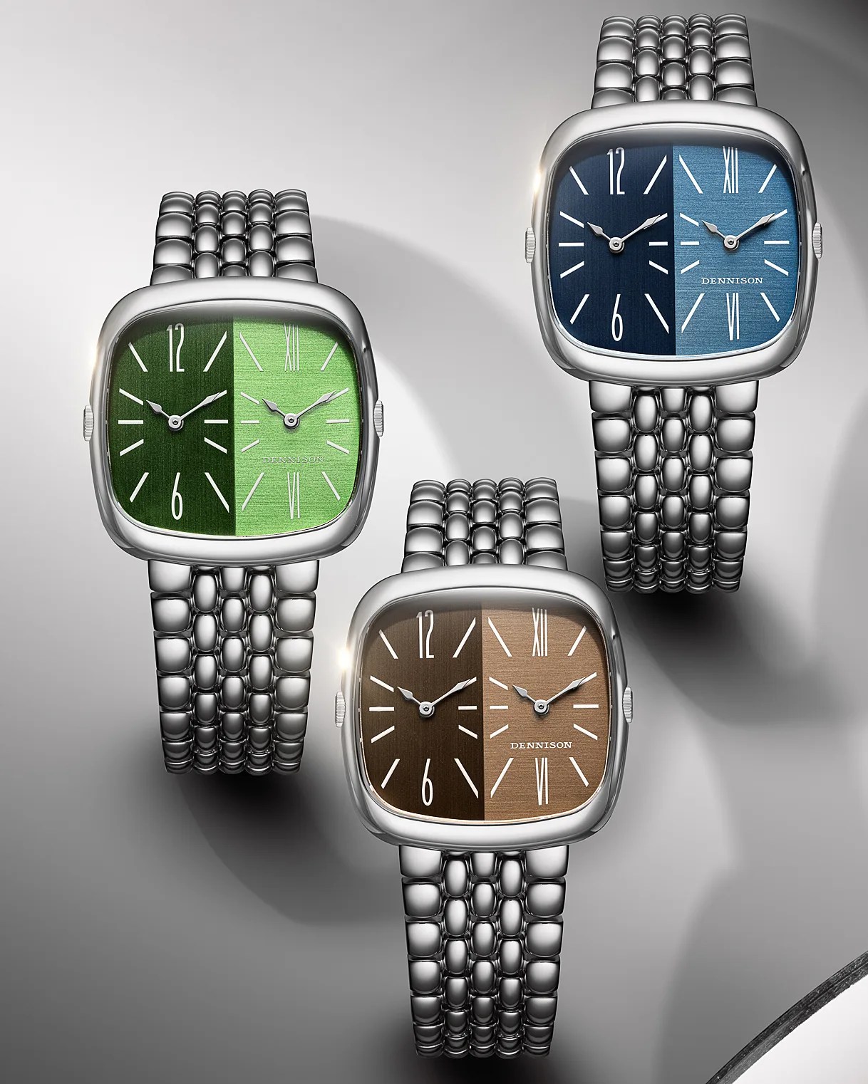 Three square-faced wristwatches with silver metal link bands and dual-tone dials in green, blue, and brown shades.