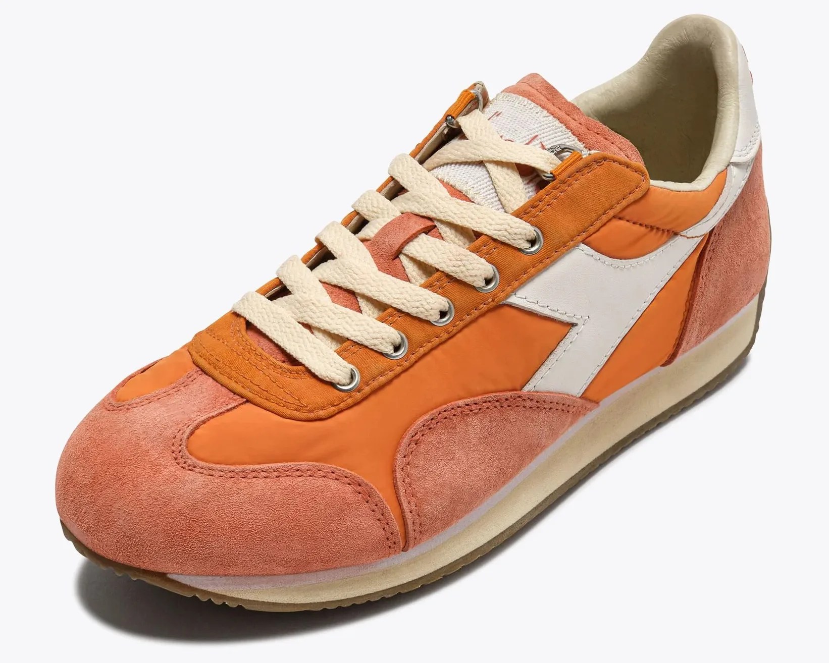 Orange and pink suede sneaker with white leather side logo and cream laces.