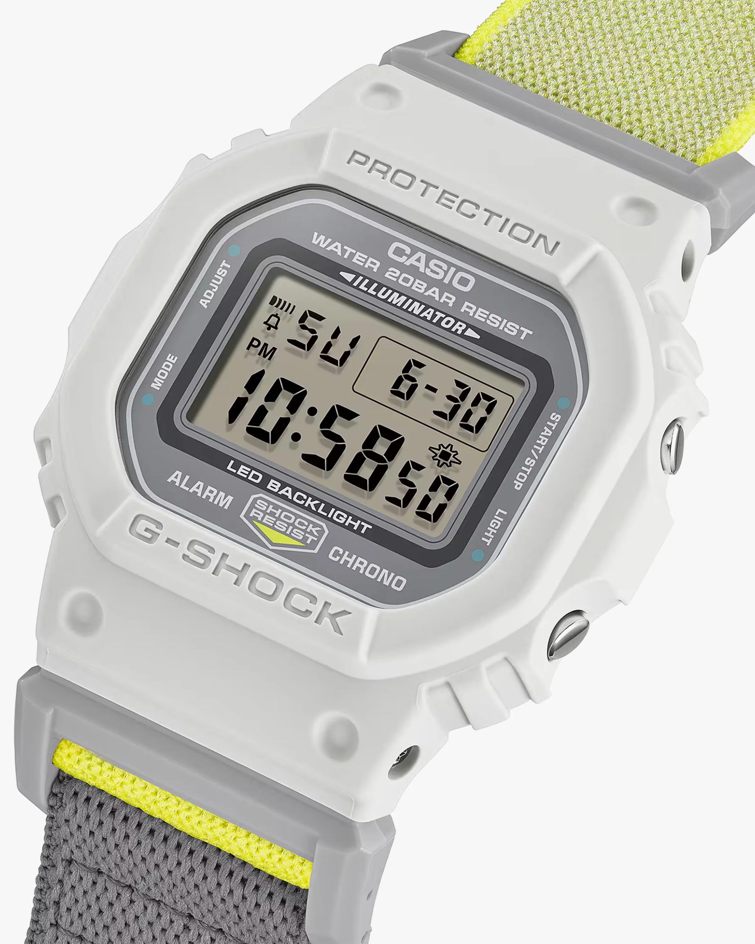 White Casio G-Shock digital watch with gray and yellow fabric strap and LED display showing time and date.