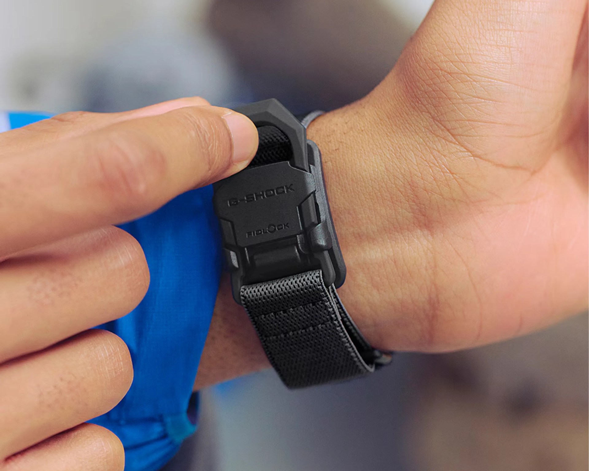Black G-Shock Fidlock watch strap with a textured fabric band worn on a wrist.