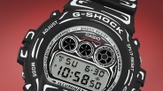 Black Casio G-Shock digital watch with white graphic accents and a red background.