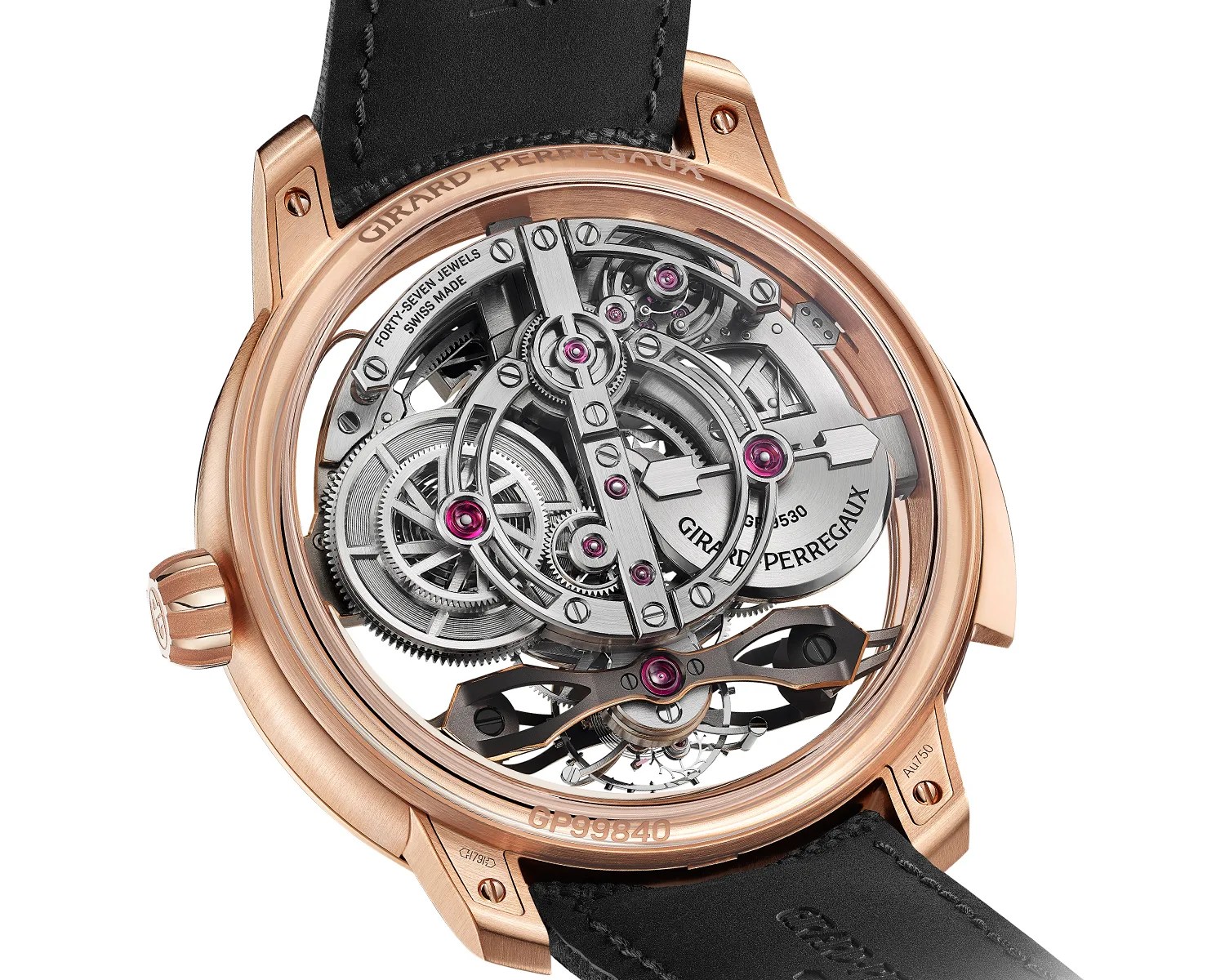 Rose gold Girard-Perregaux watch back showing intricate mechanical movement with visible gears and jewels.