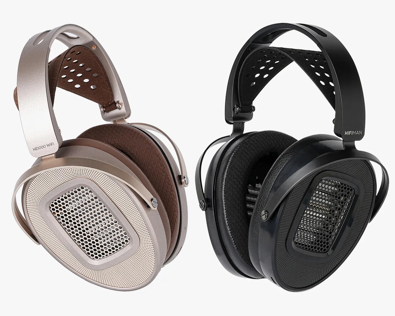 Two pairs of over-ear headphones, one in silver with brown ear pads and the other in black with black ear pads, both with perforated headbands.