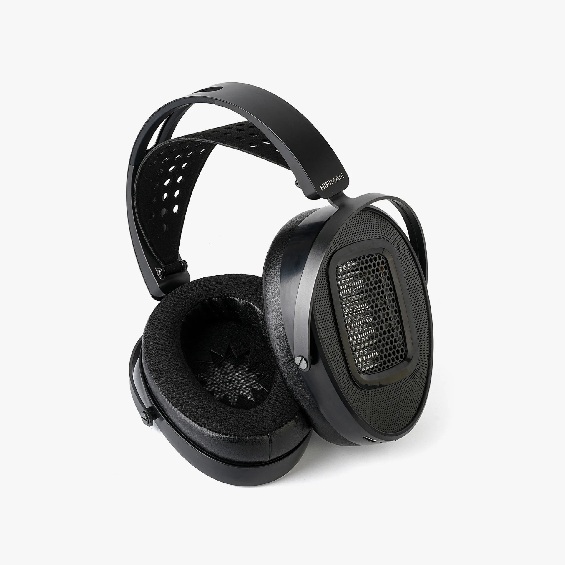Black HIFIMAN over-ear headphones with perforated headband and mesh ear cups.