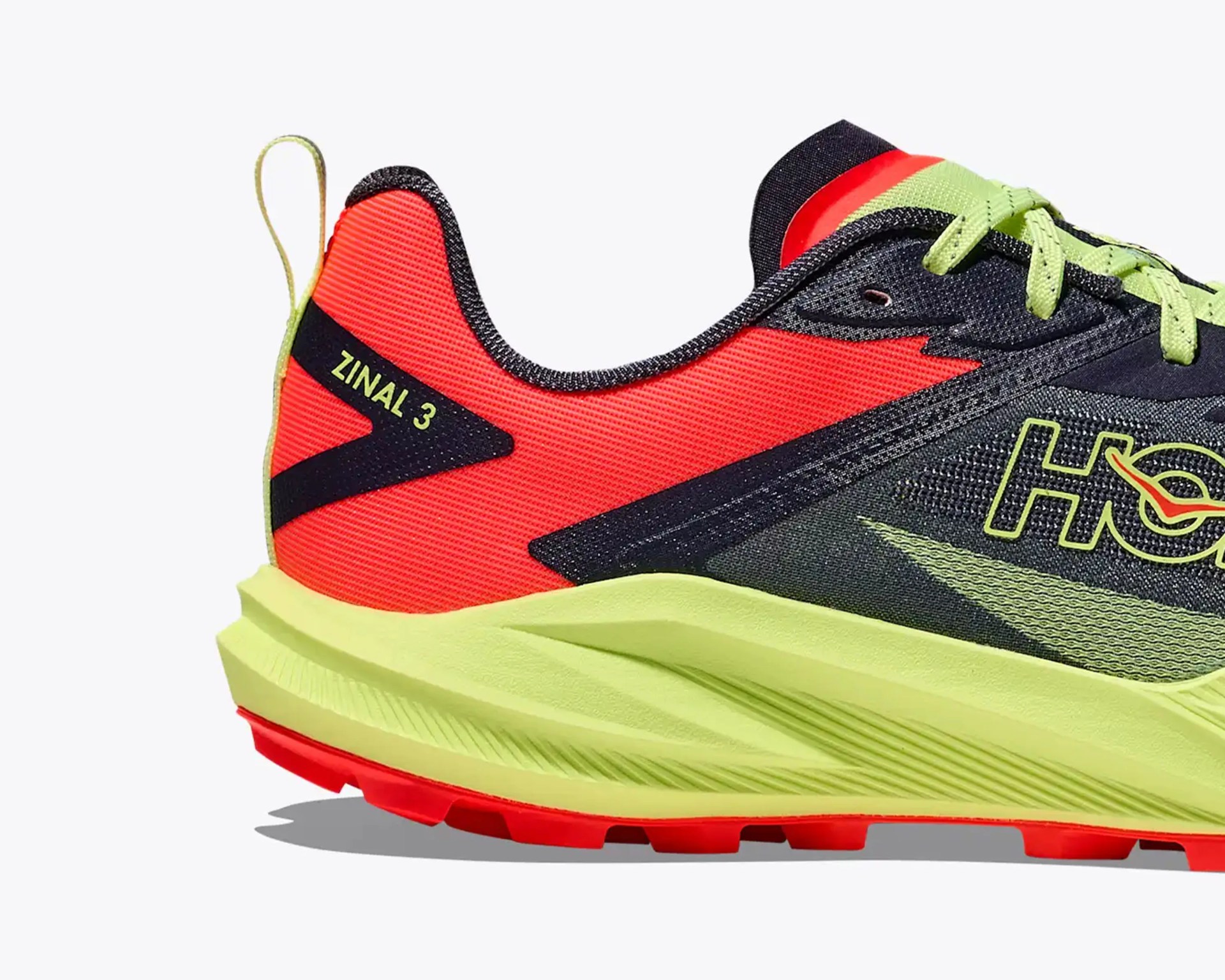 Close-up of a black and red Hoka Zinal 3 running shoe with neon yellow sole and laces.